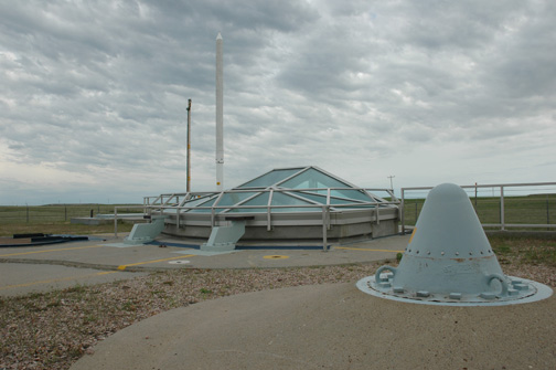 Glass structure over the silo allows visitors to look down at the missile