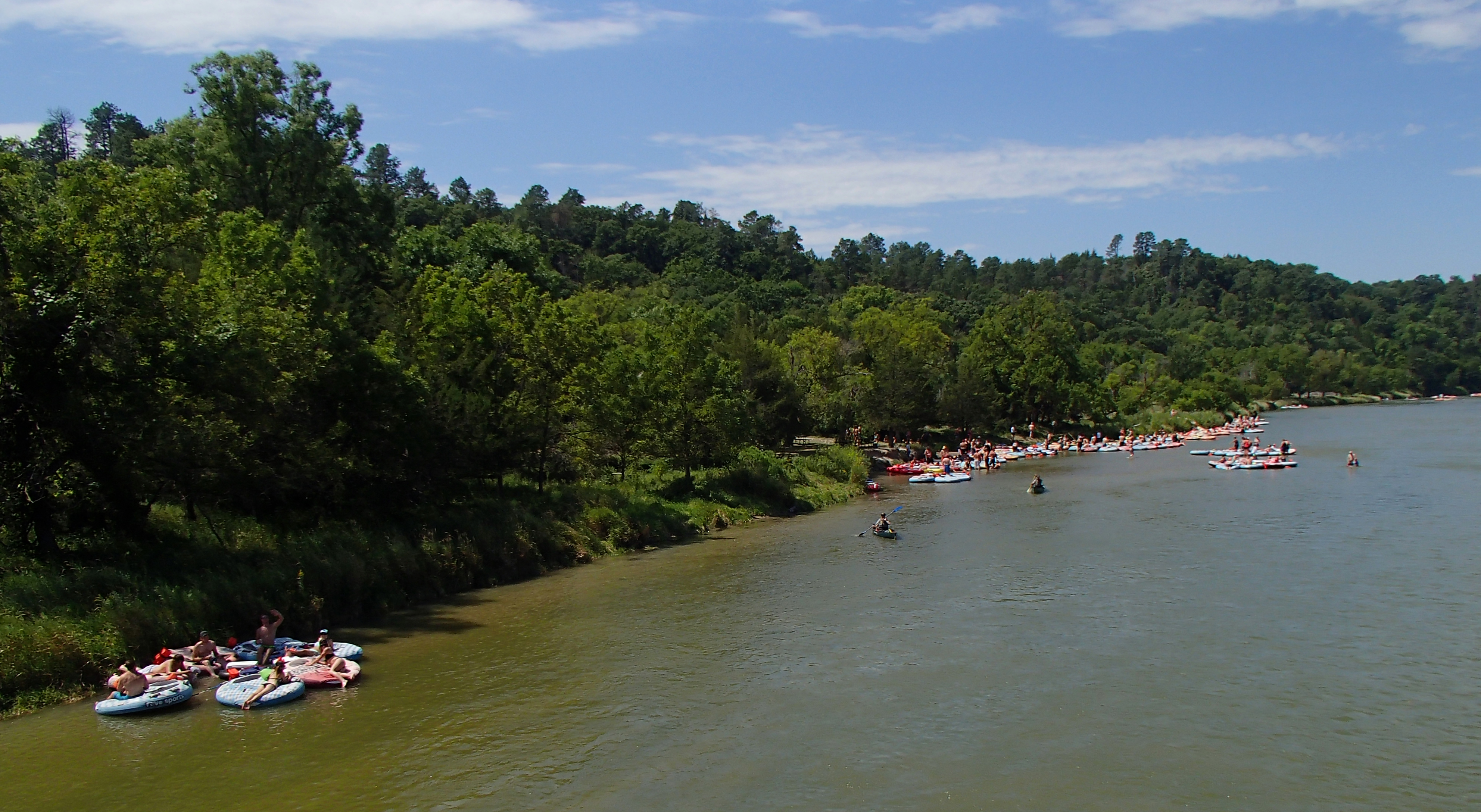 Many people on tubes float down the Niobrara.
