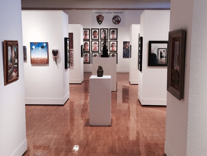 Franklin G. Smith Gallery paintings hang from art gallery walls