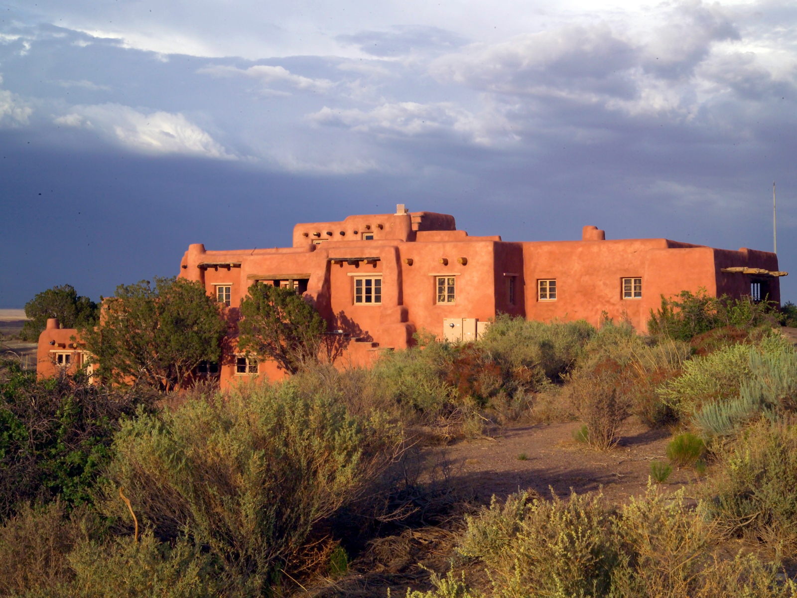 Sunset lights up the Painted Desert Inn National Historic Landmark west side.