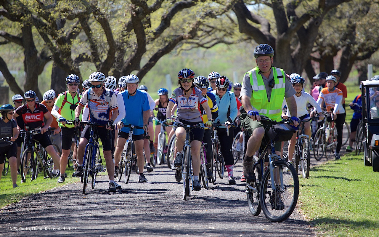 Luci Johnson (center in gray jersey) leads a bike tour