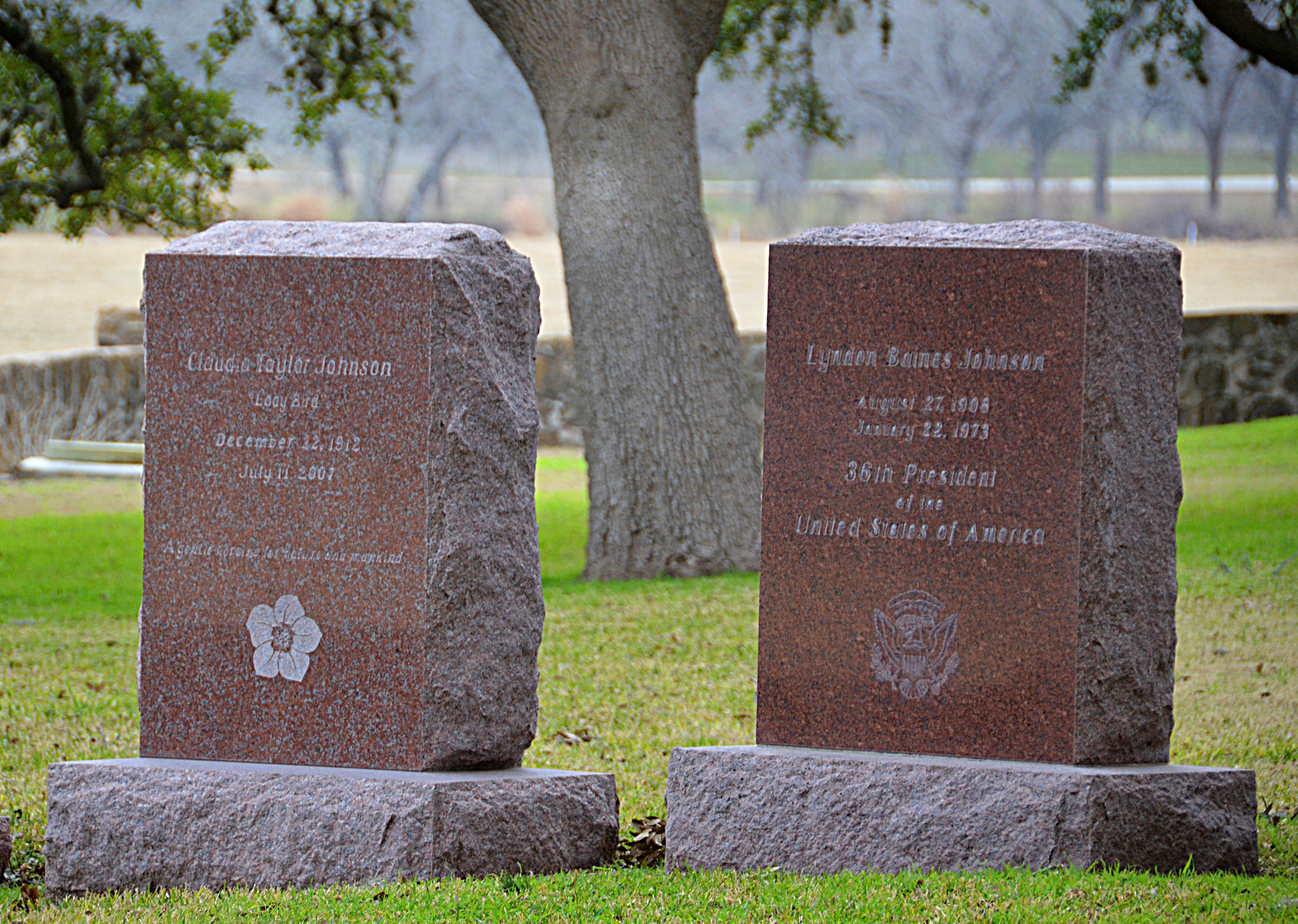 Pink granite headstones mark the graves of President Lyndon Johnson and First Lady Lady Bird Johnson