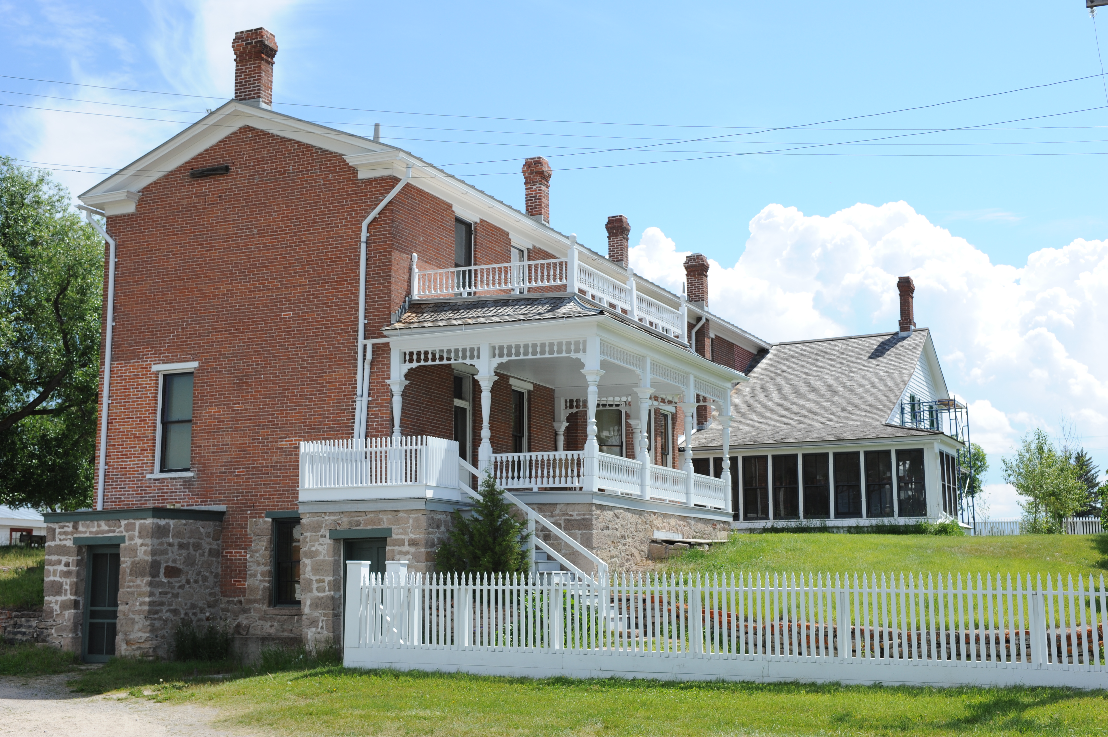 A view of the rear of the ranch house.