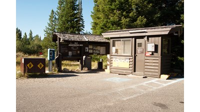 Jenny Lake Campground registration kiosk with campground information.