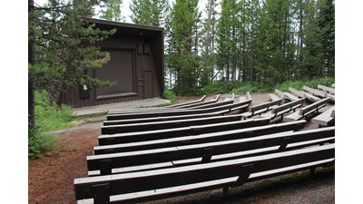 Amphitheater with building and bench seats at campground