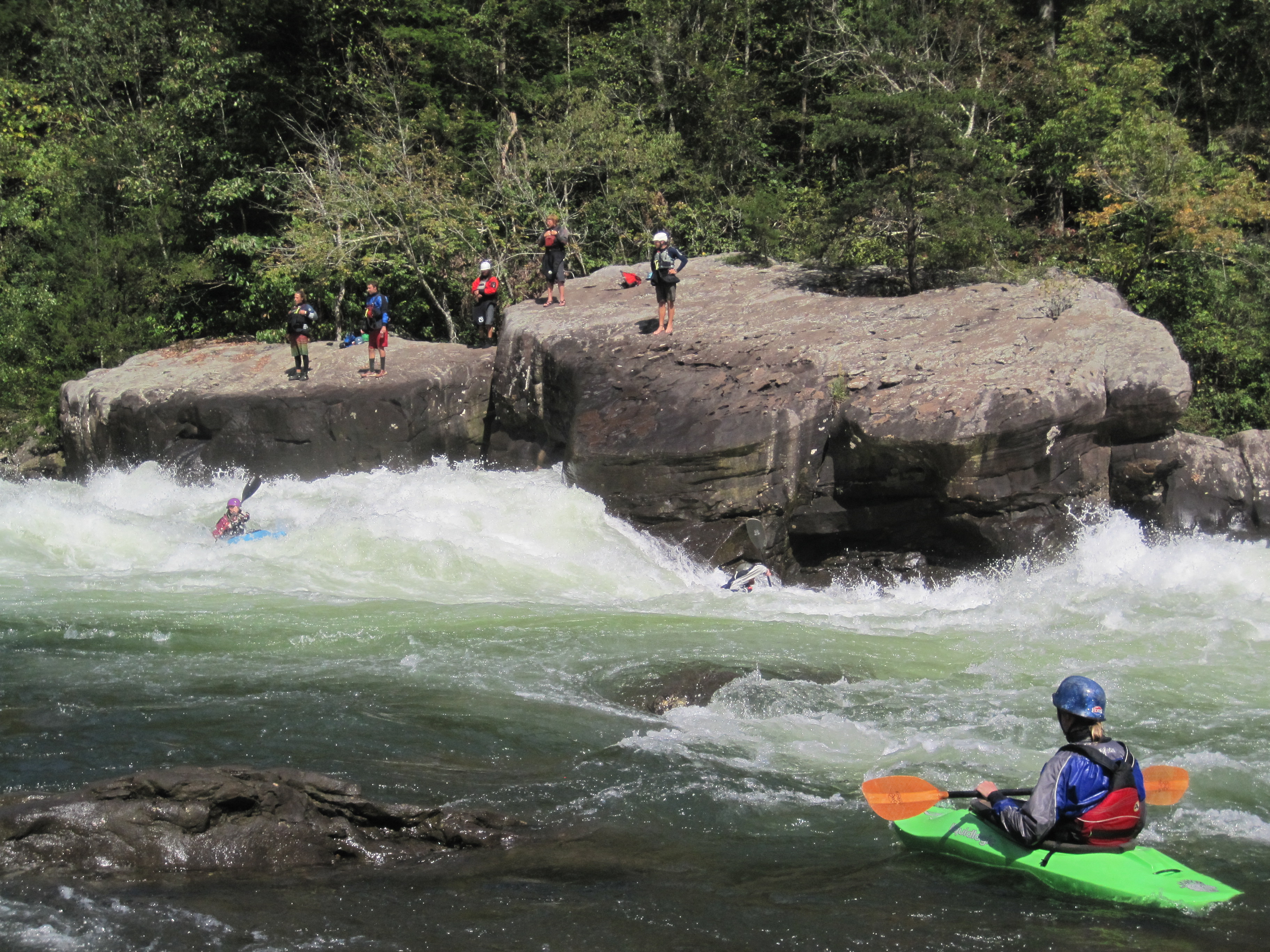 Kayakers coming through Pillow Rock rapid on Gauley River