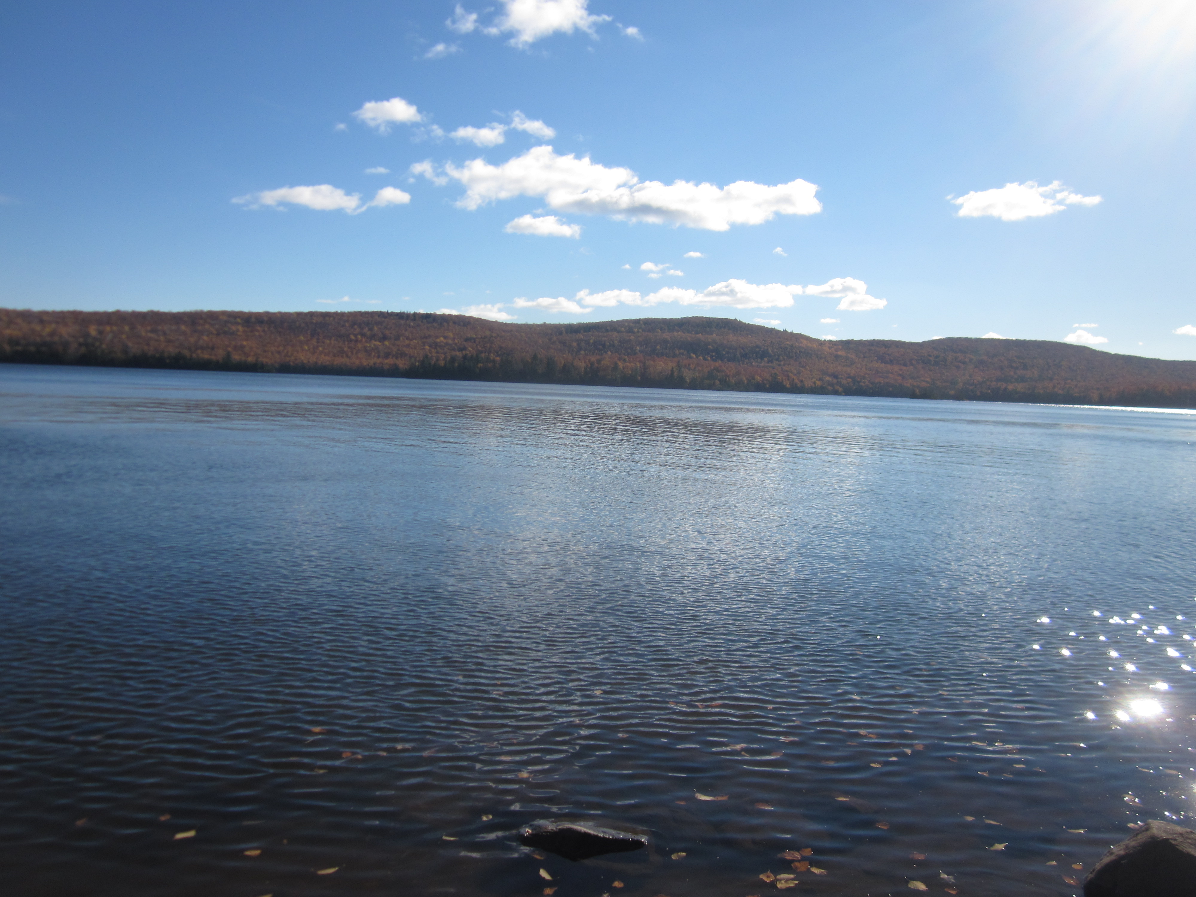 View of the blue waters of Lake Desor from the North Lake Desor Campground.