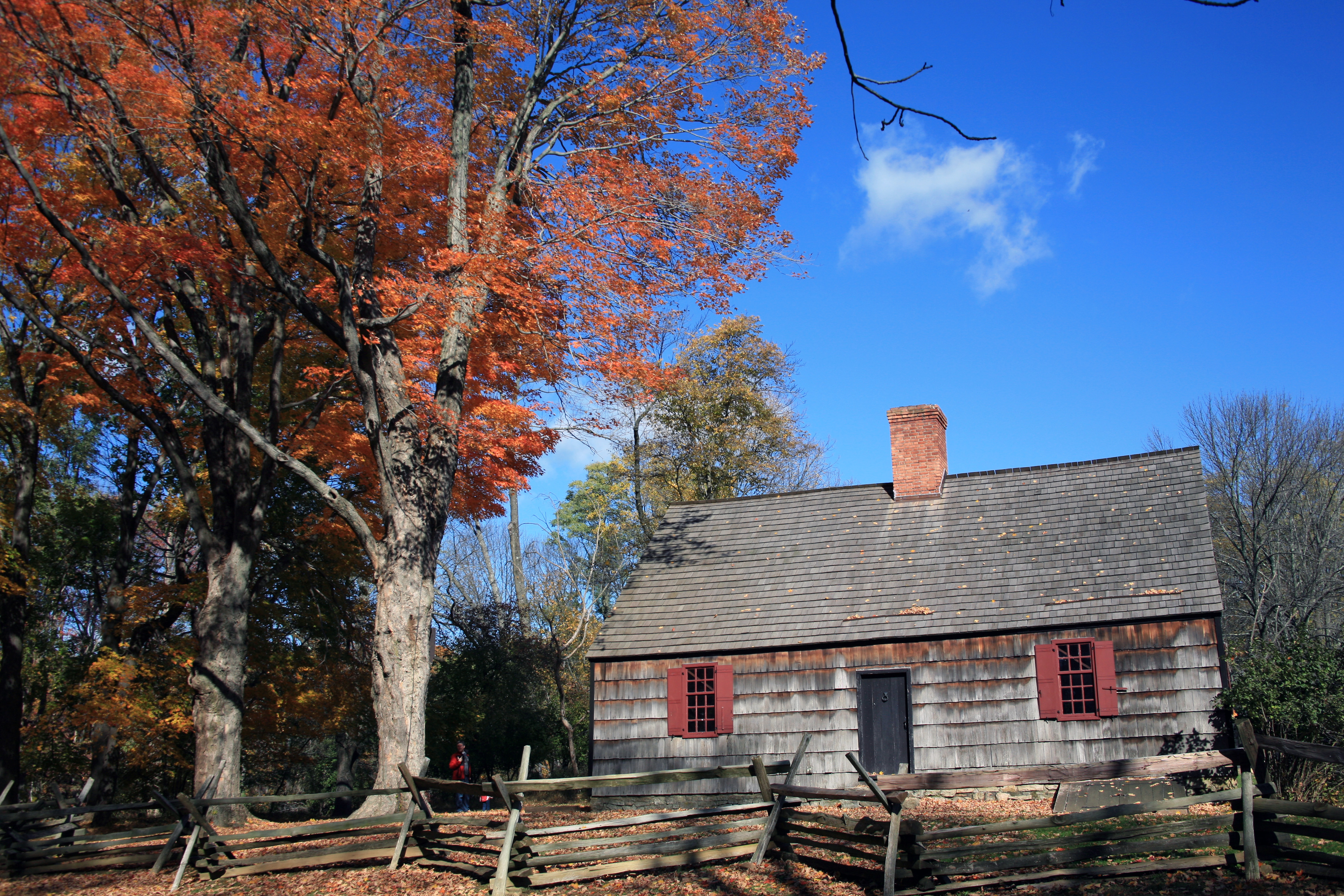 The Wick House surrounded by colorful fall leaves