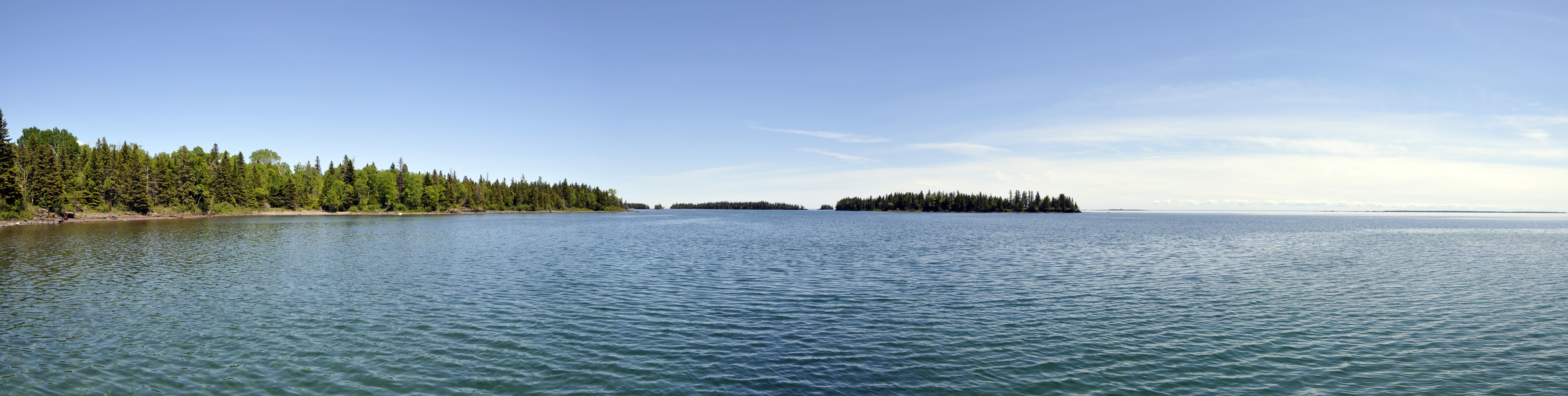 View of the blue waters of Malone Bay from the shoreline.