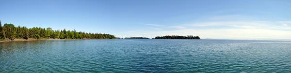 View of the blue waters of Malone Bay from the shoreline.