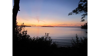 Multi-colored sunset at Todd Harbor Campground.
