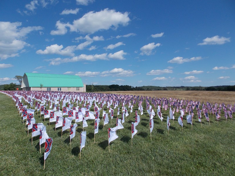 Memorial Day Flag Display Small flags fly in the breeze in front of the visitor center.