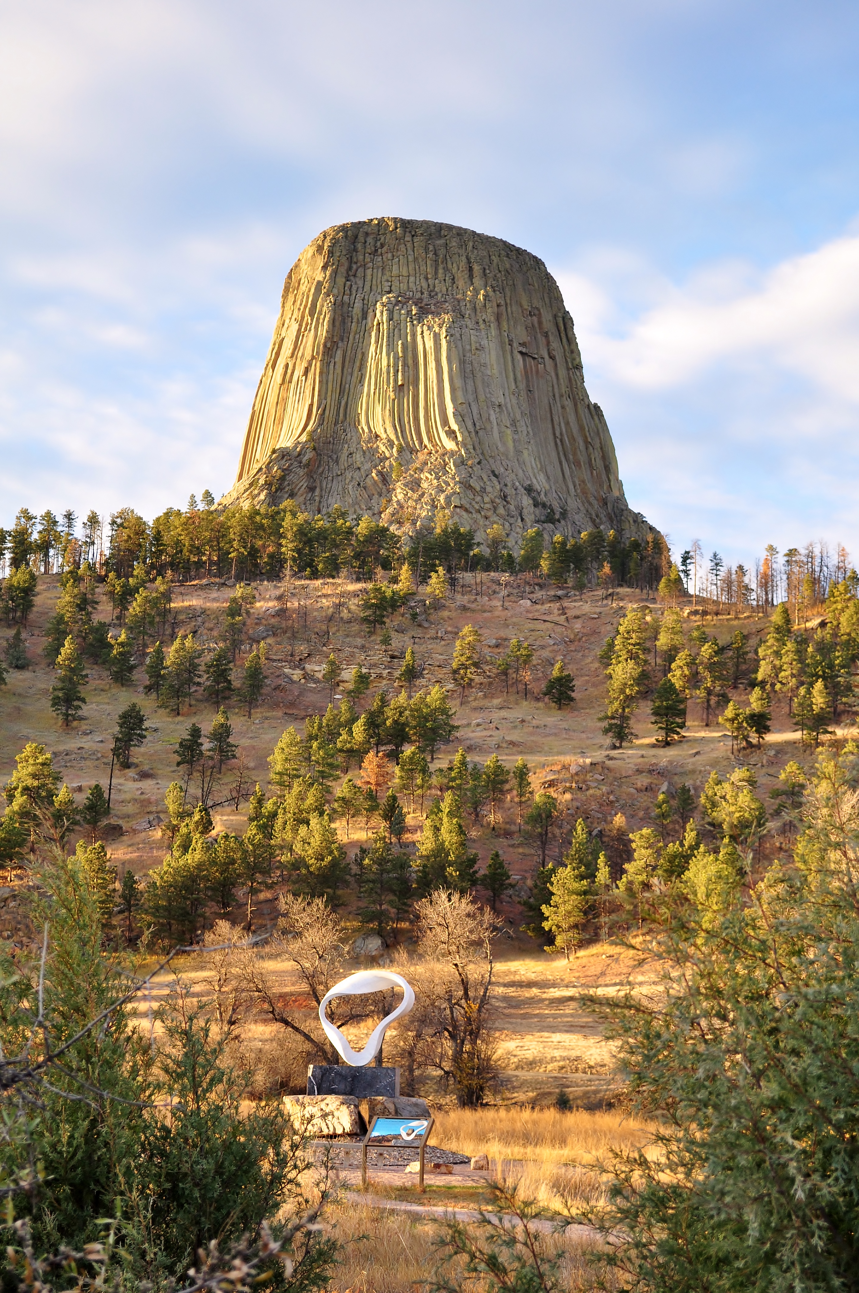 Devils Tower overlooking the Circle of Sacred Smoke Sculpture