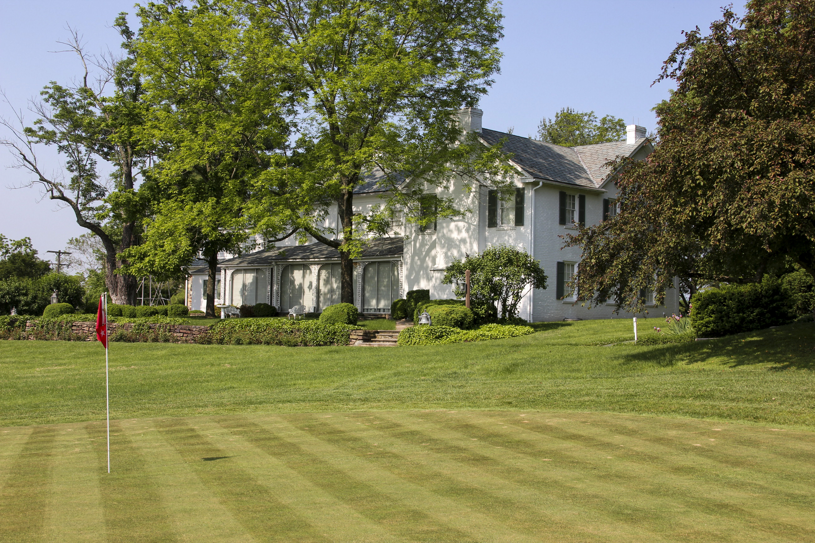 The Eisenhower home with Ike's putting green in the foreground