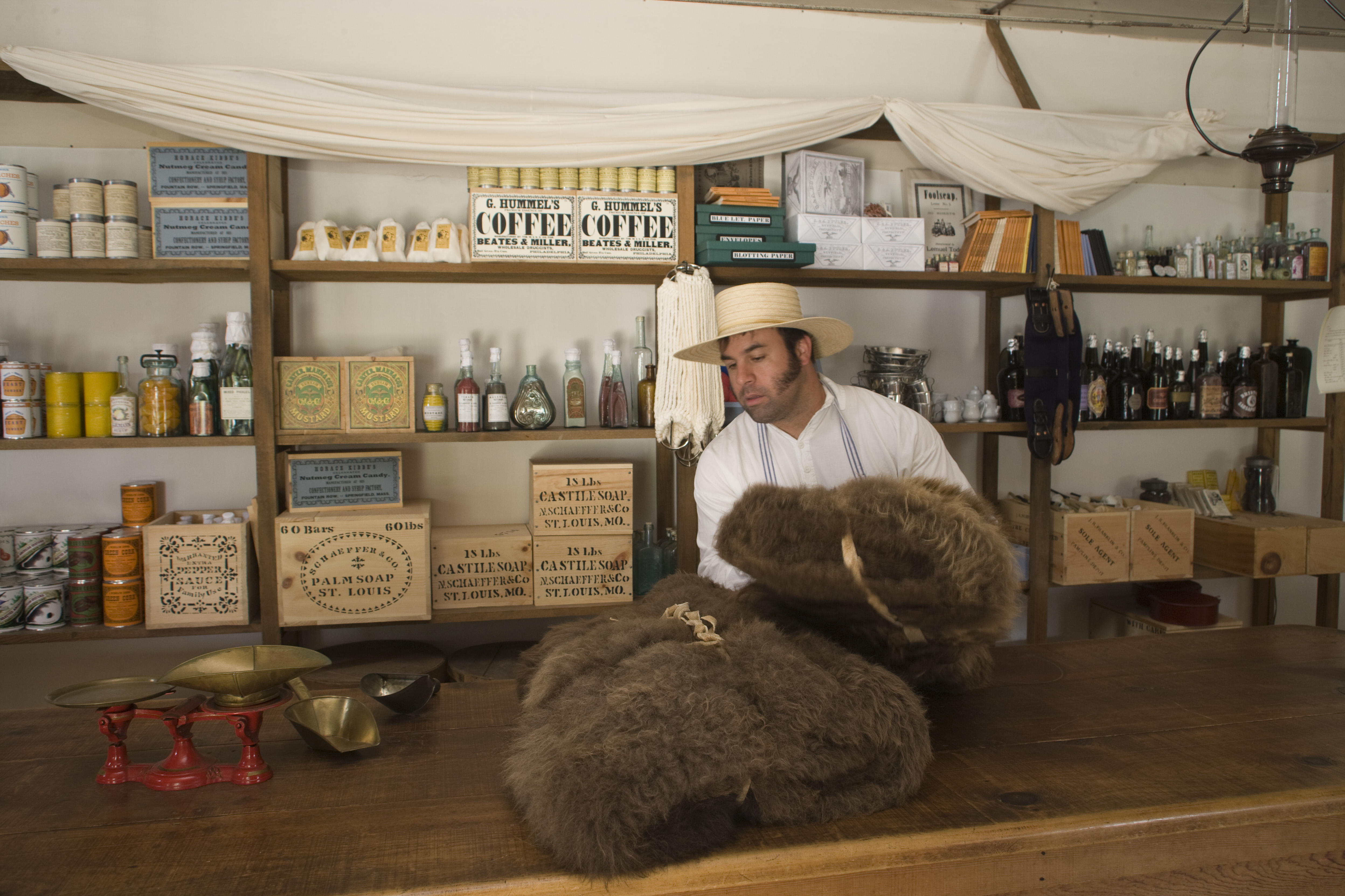 Living history interpreter portraying the Post Trader.