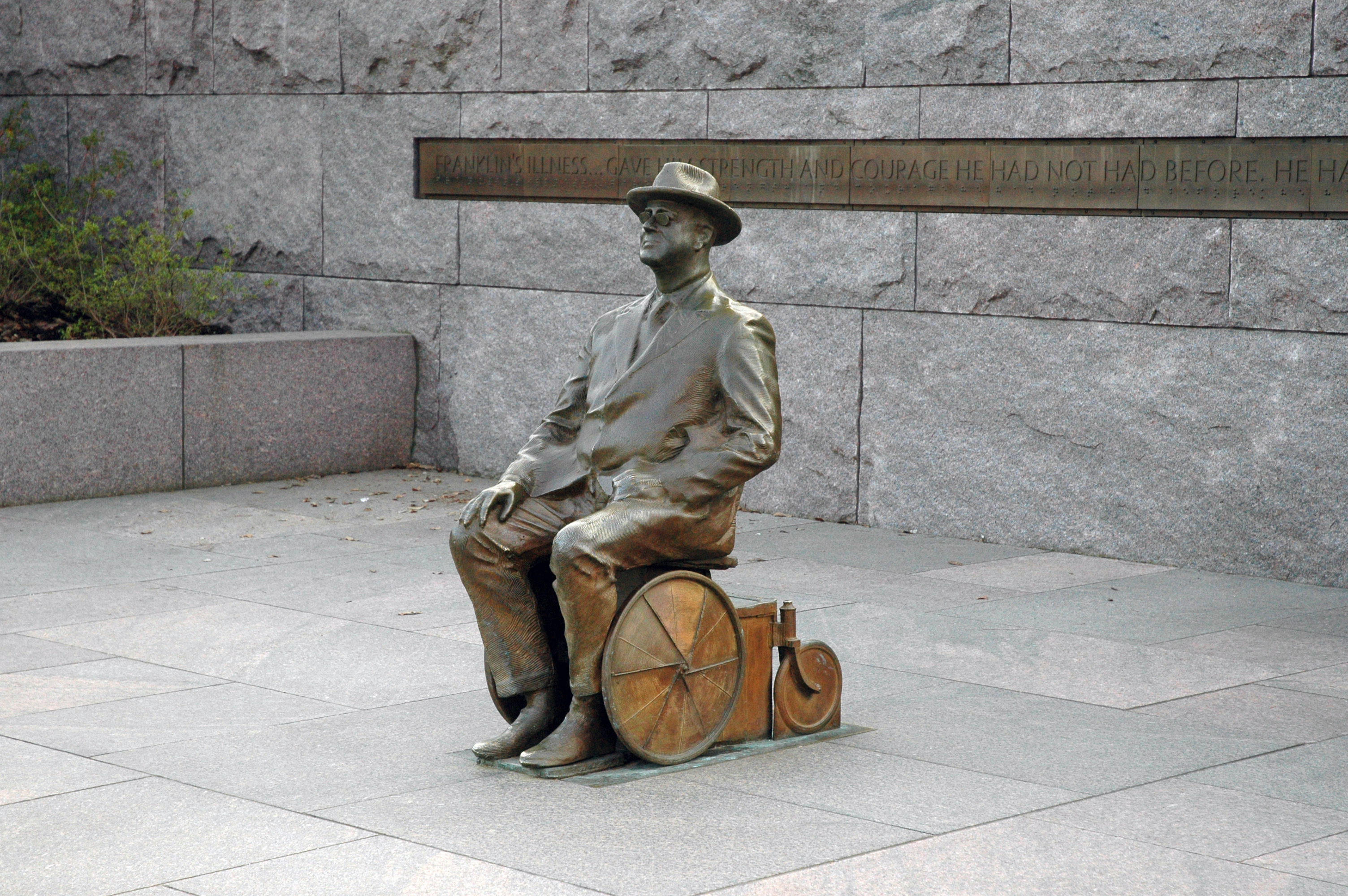 Picture of FDR in a wheel chair within his memorial