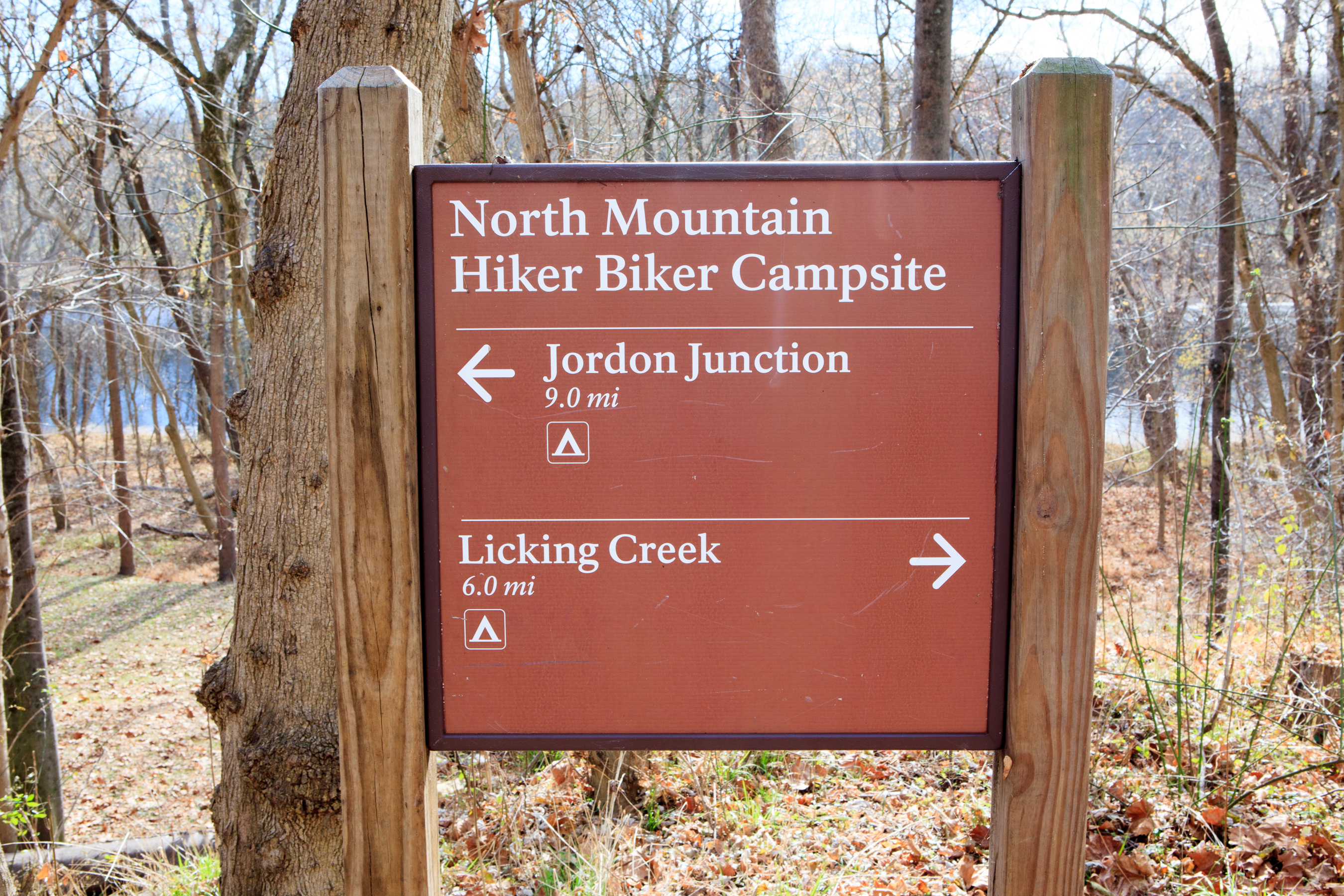 Campsite sign describing next nearest camping areas.