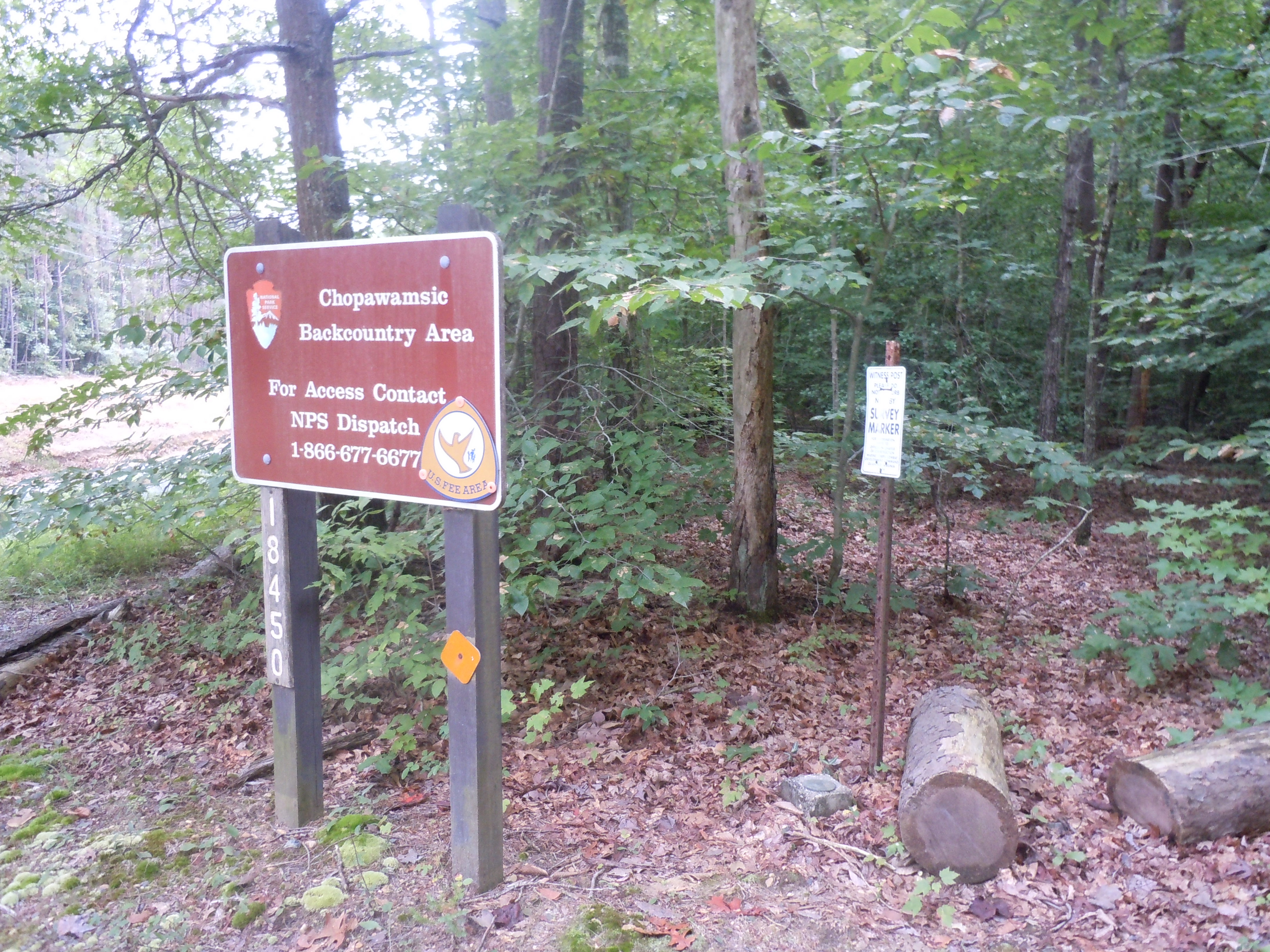 a park sign marks the entrance to the backcountry area