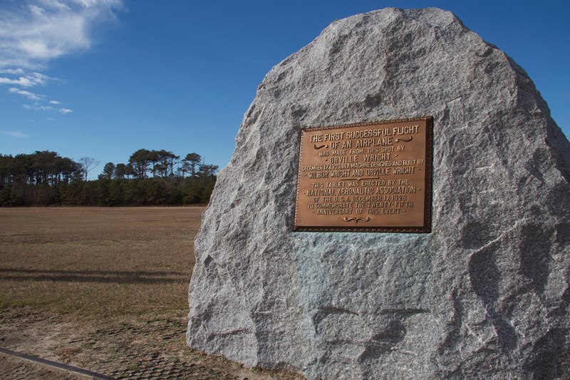 First Flight Boulder The large boulder and plaque sit where the Wright brothers first flew in their 1903 flyer.