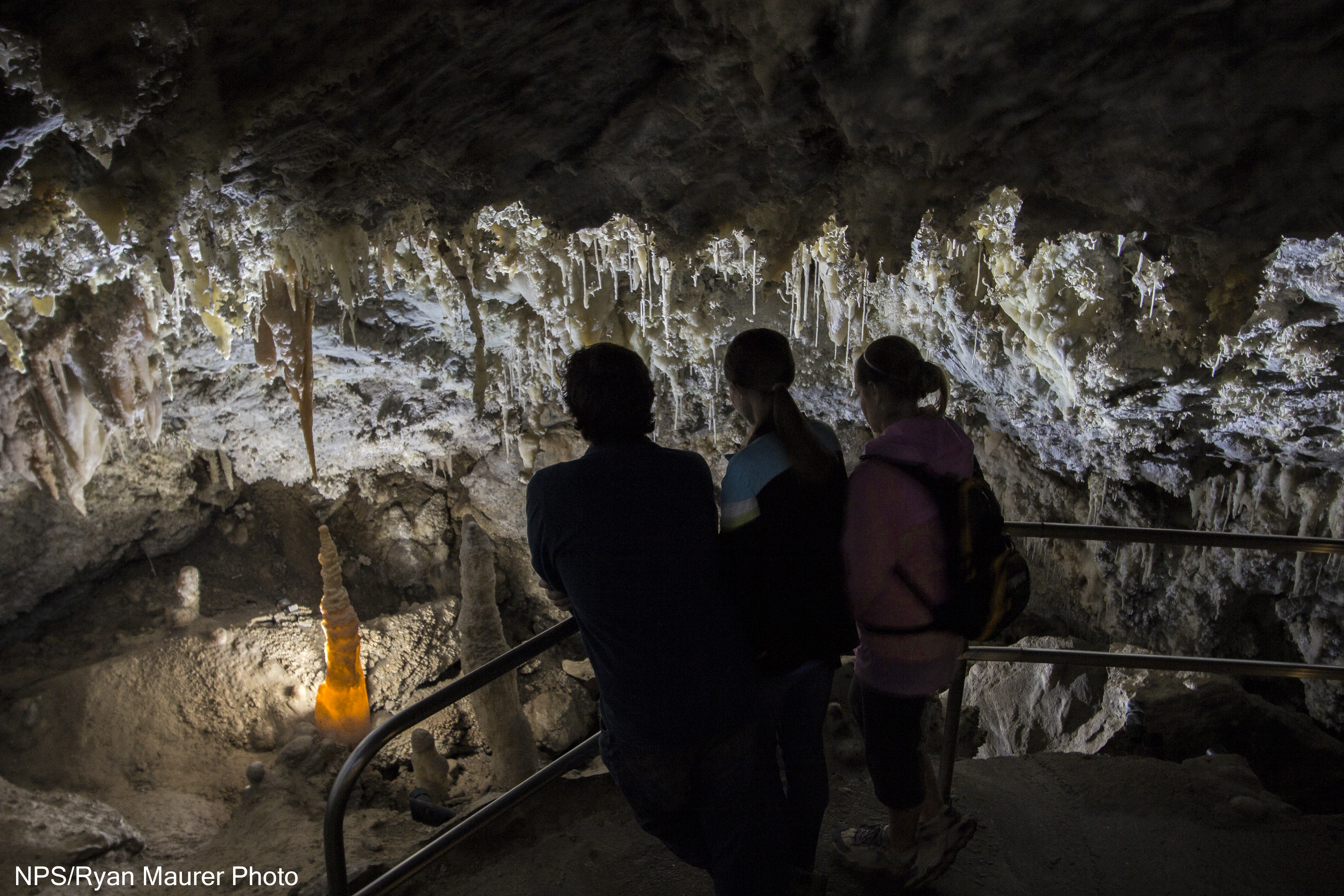 Visitors gaze at delicate cave formations in Timpanogos Cave's Chimes Chamber
