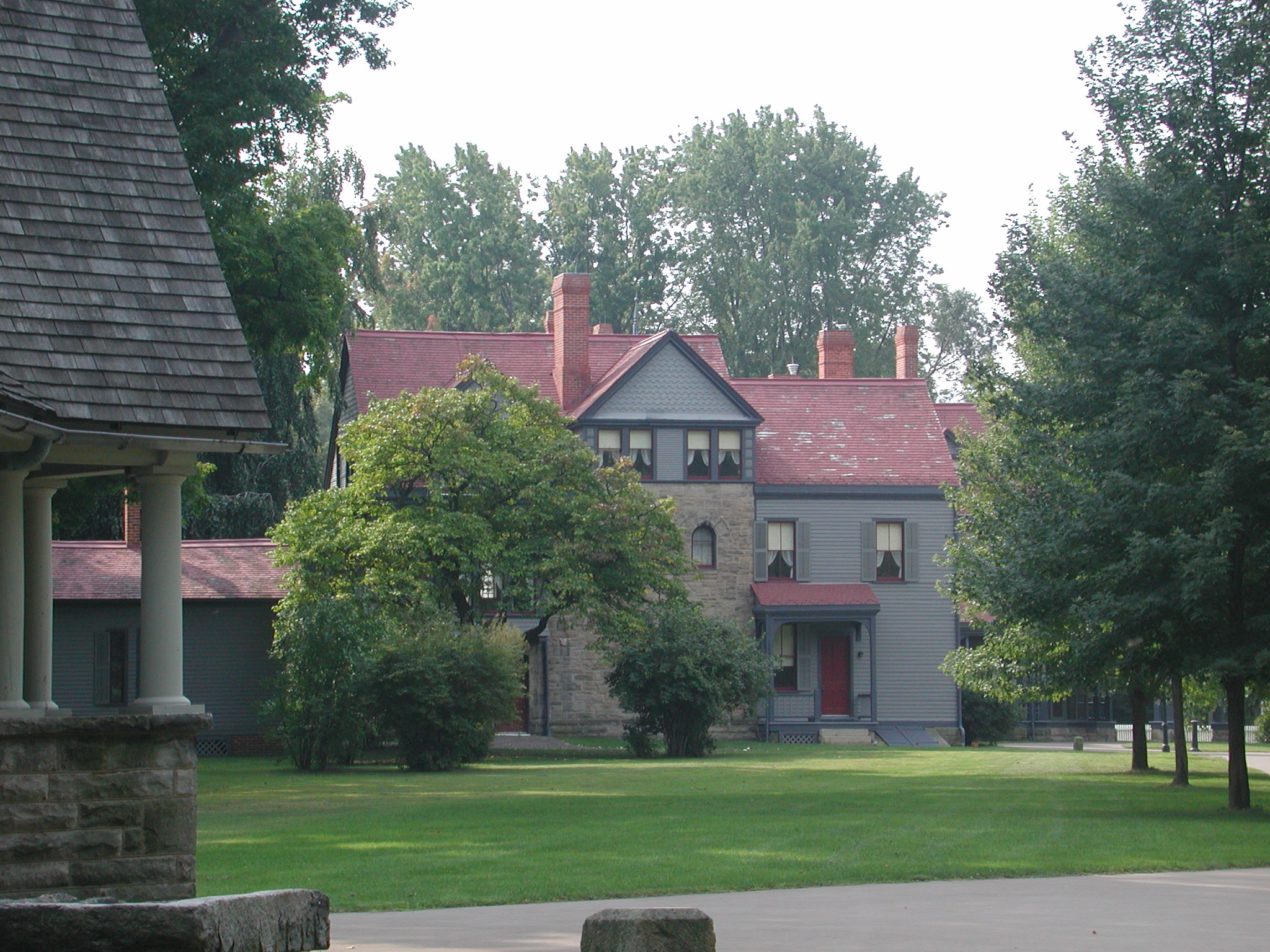 A view of the memorial library addition through the trees.