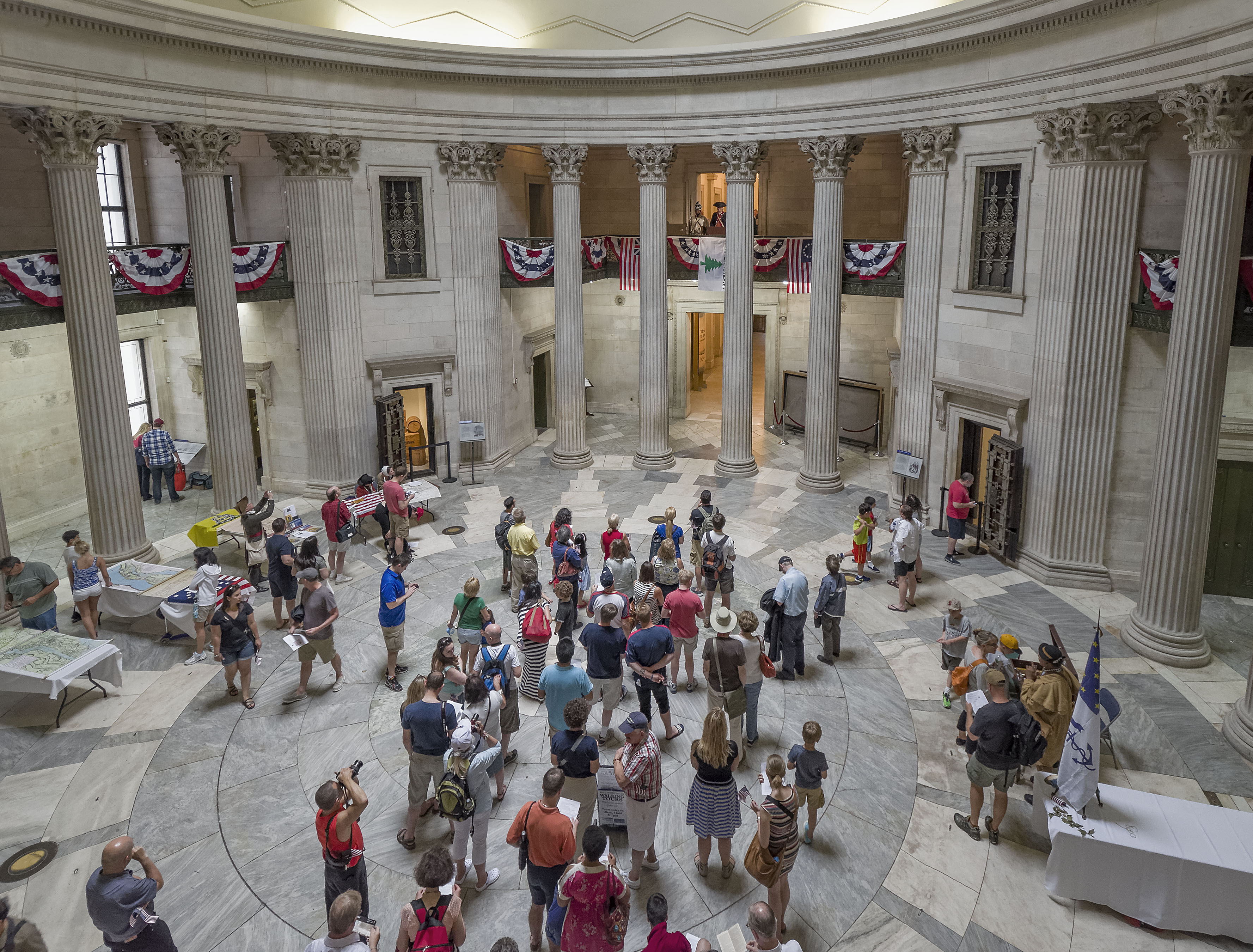 “Large crowd inside the rotunda of Federal Hall National Memorial”