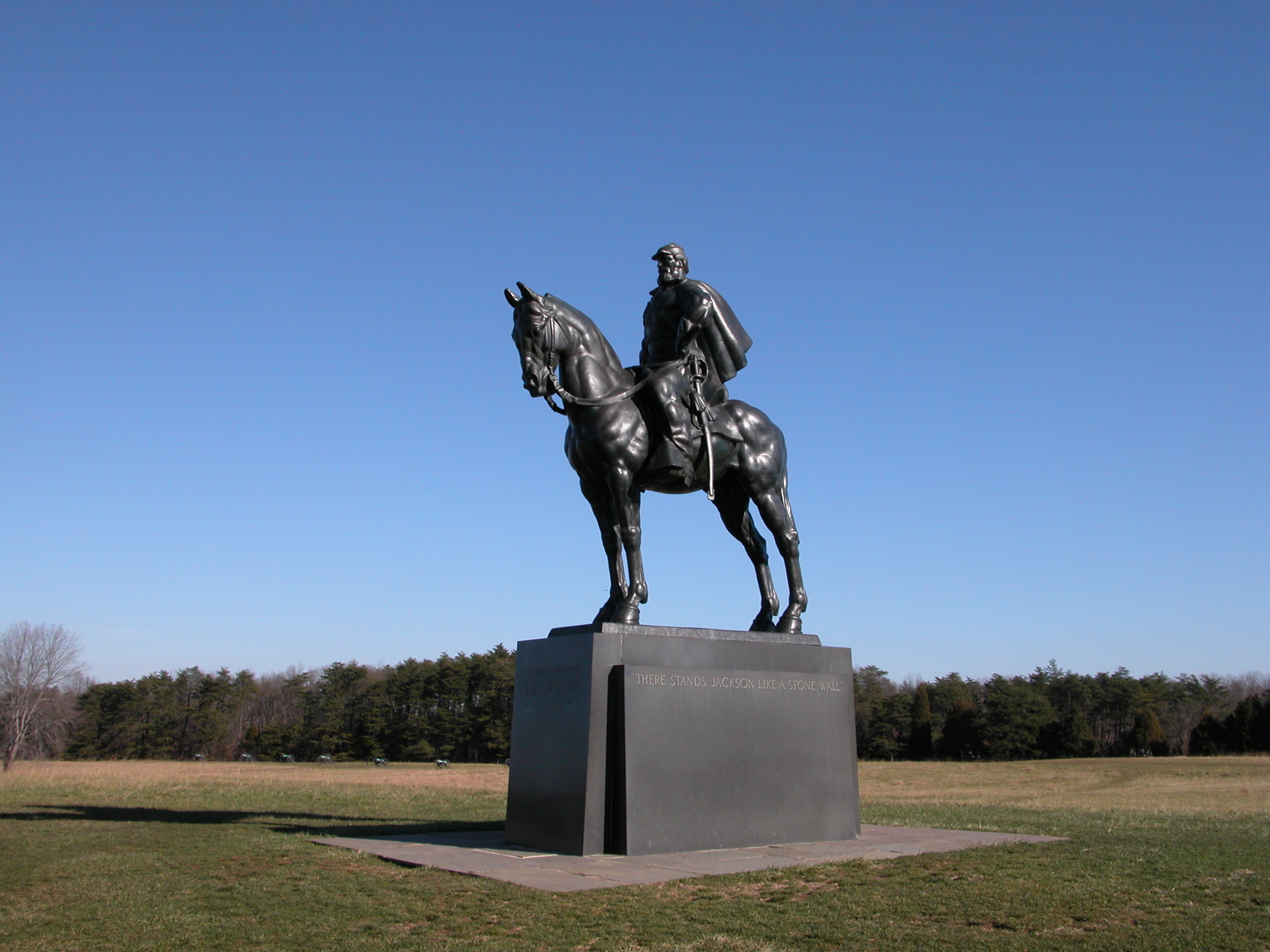 Bronze statue of Gen. T. J. "Stonewall" Jackson on horseback in an open field.