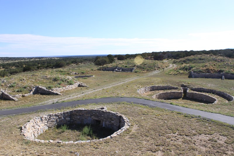 Kivas At Gran Quivira A paved path winds through the stone foundations of several old kivas.