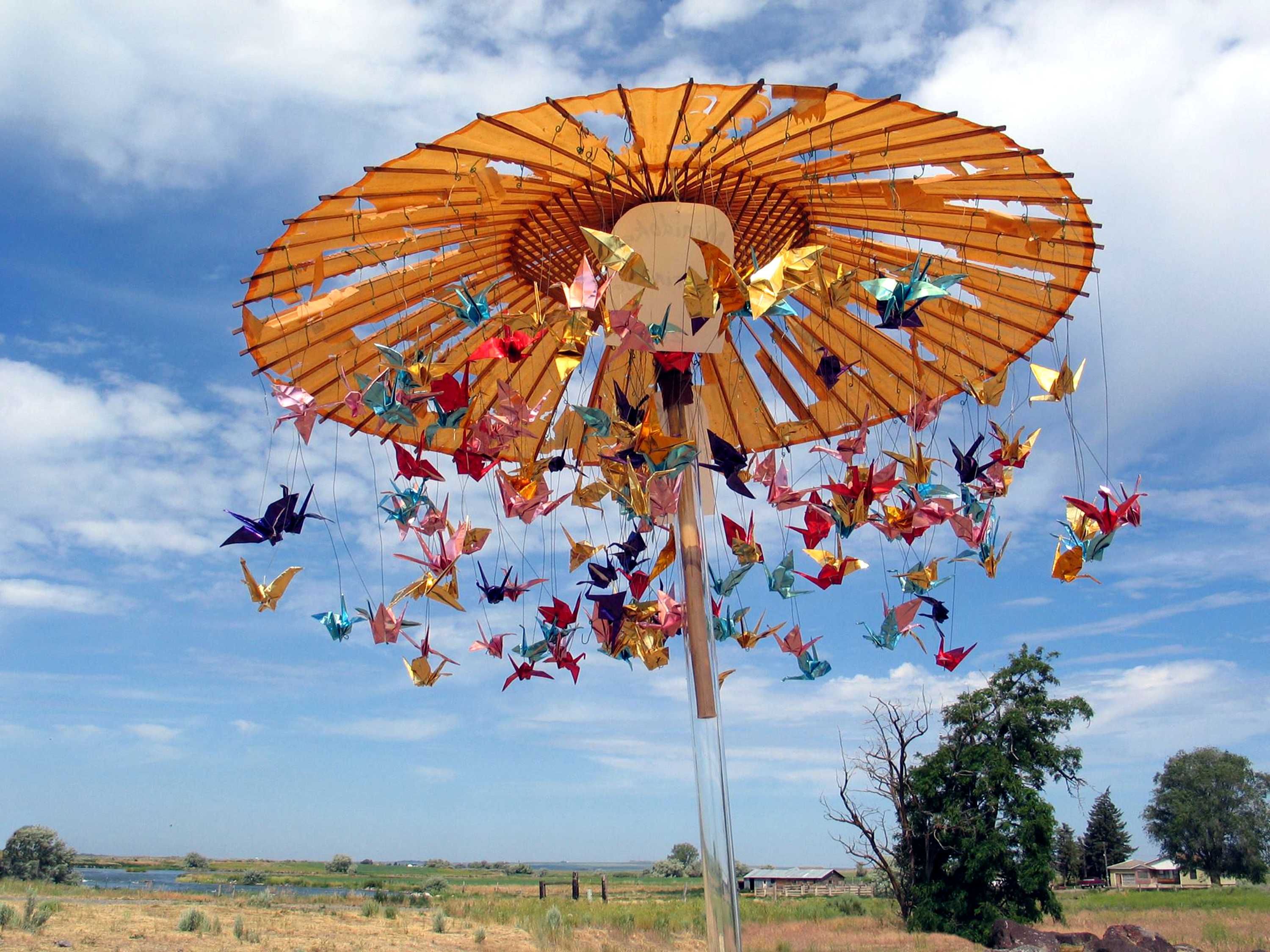 Origami cranes twirl on carousel