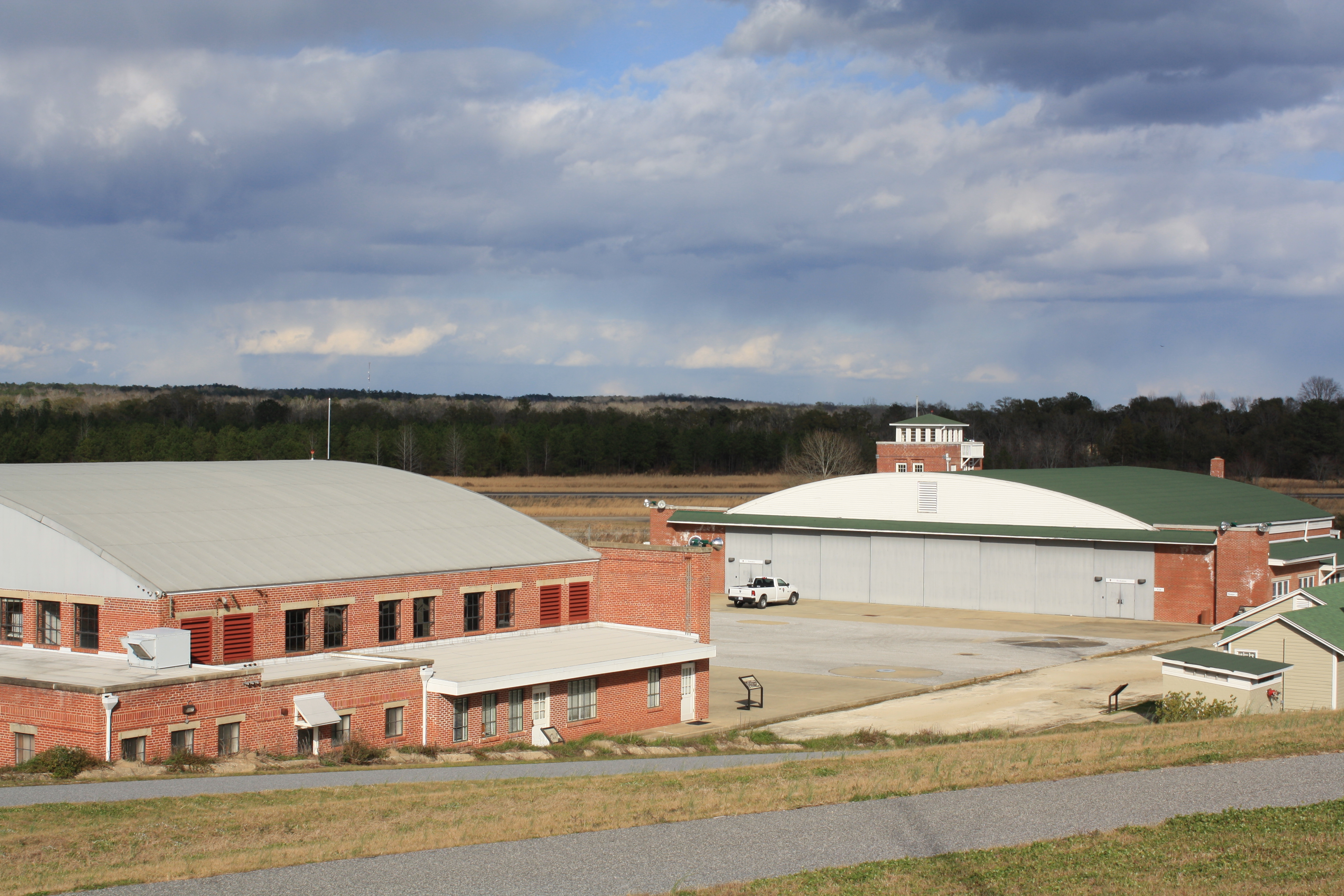 Two airplane hangars - Hangar #1 in foreground and Hangar #2 in background at Moton Field.