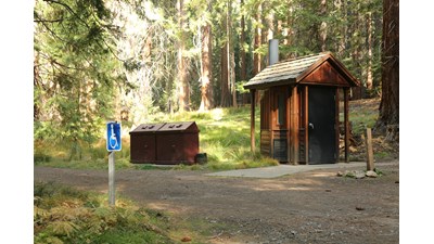 A primitive restroom building