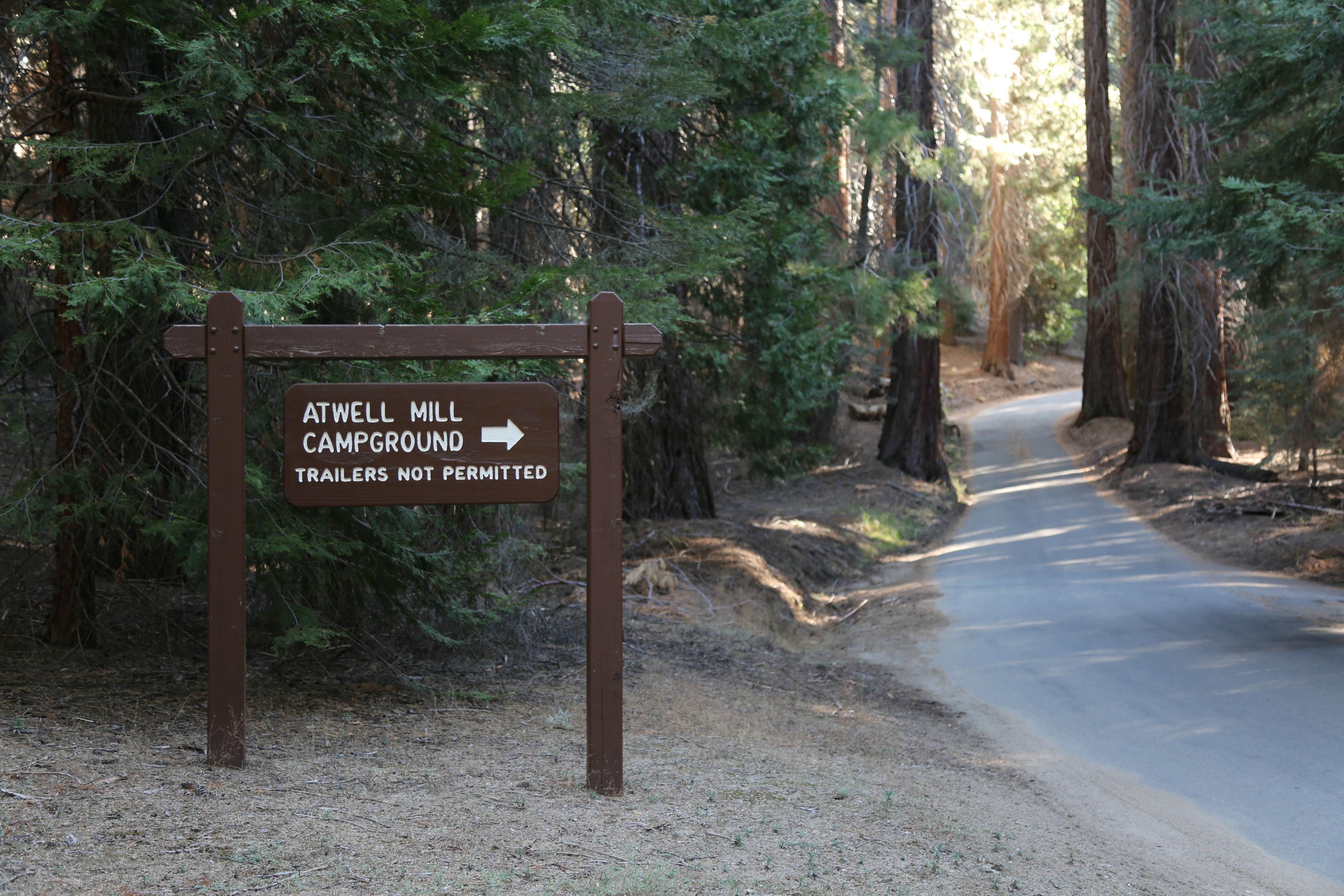 A sign reads "Atwell Mill Campground" near a narrow road