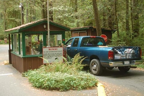 A pickup truck pulls up to the campground.