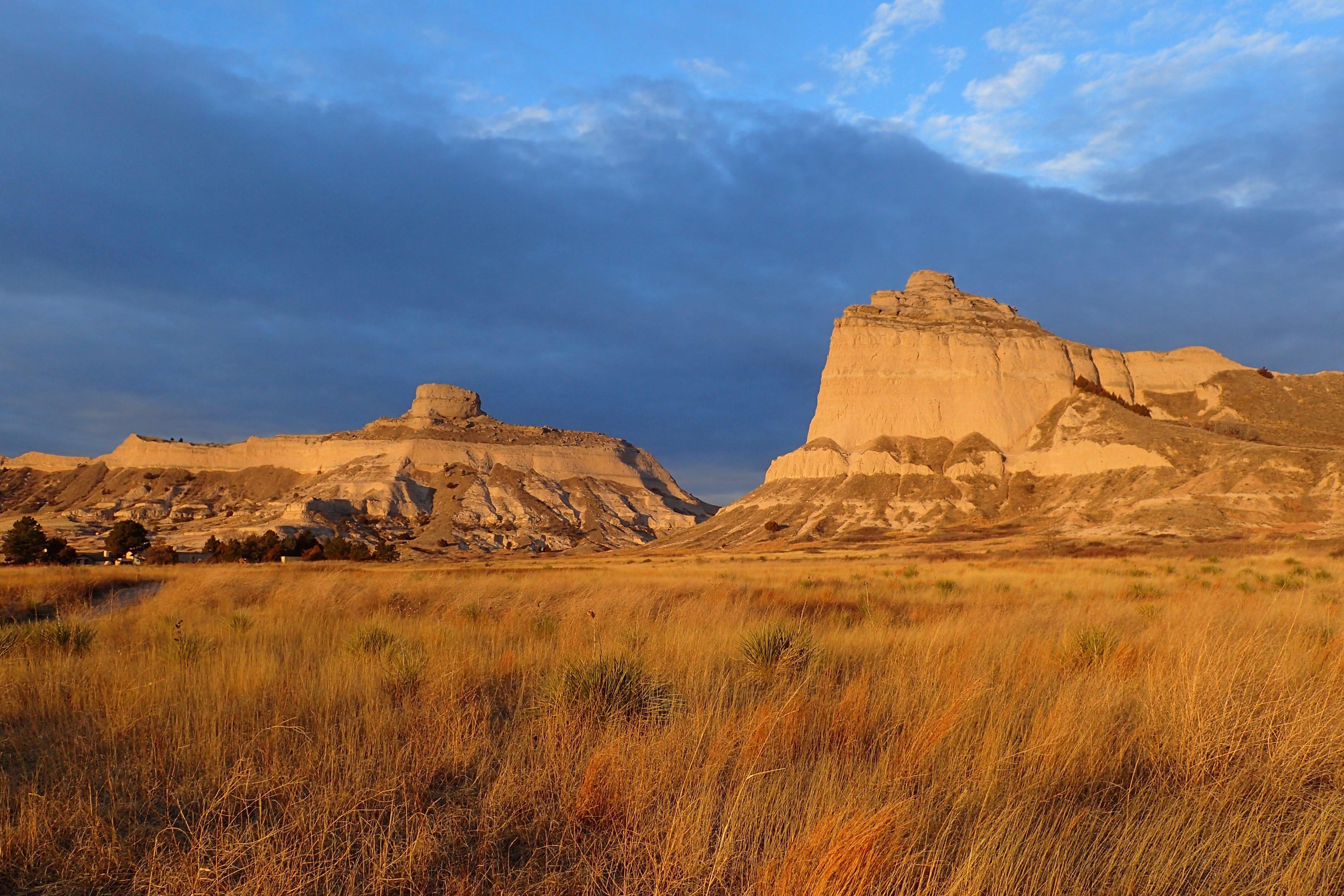 The distinctive rock formations of Mitchell Pass glow with early morning light.
