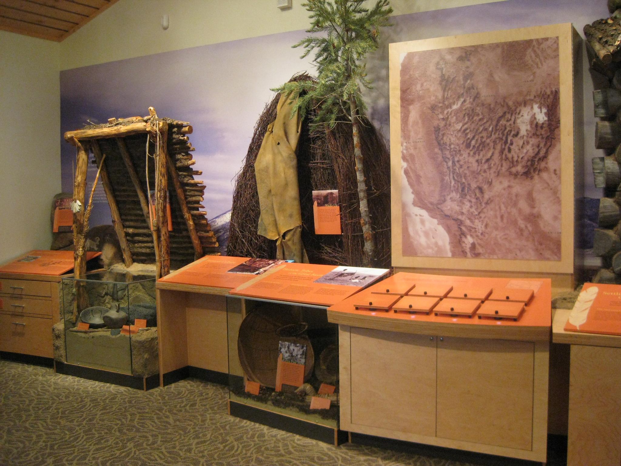 Tan exhibits at the Great Basin Visitor Center. Models of various structures the people of the area