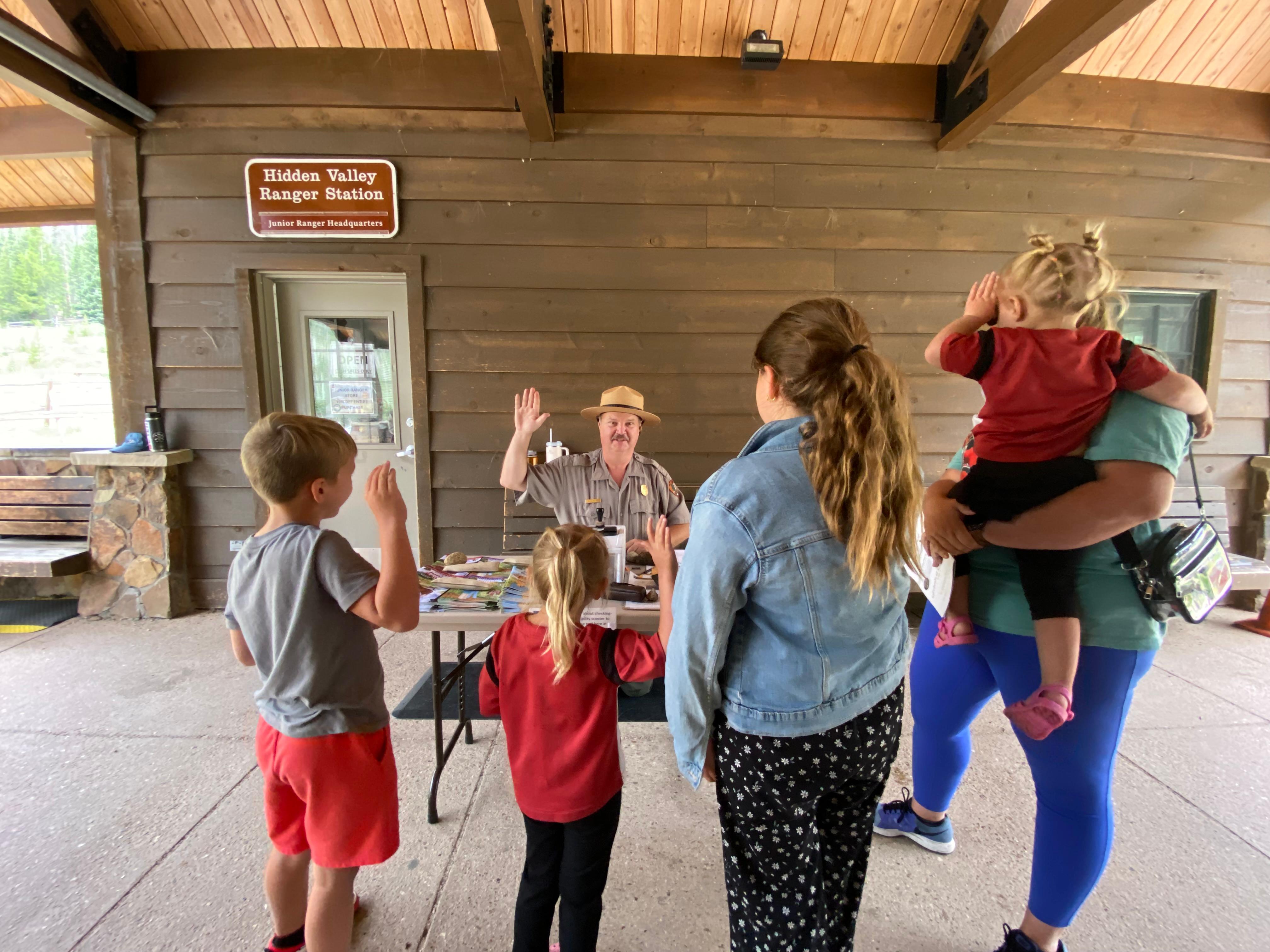 A group of Junior Rangers are receiving their new badges