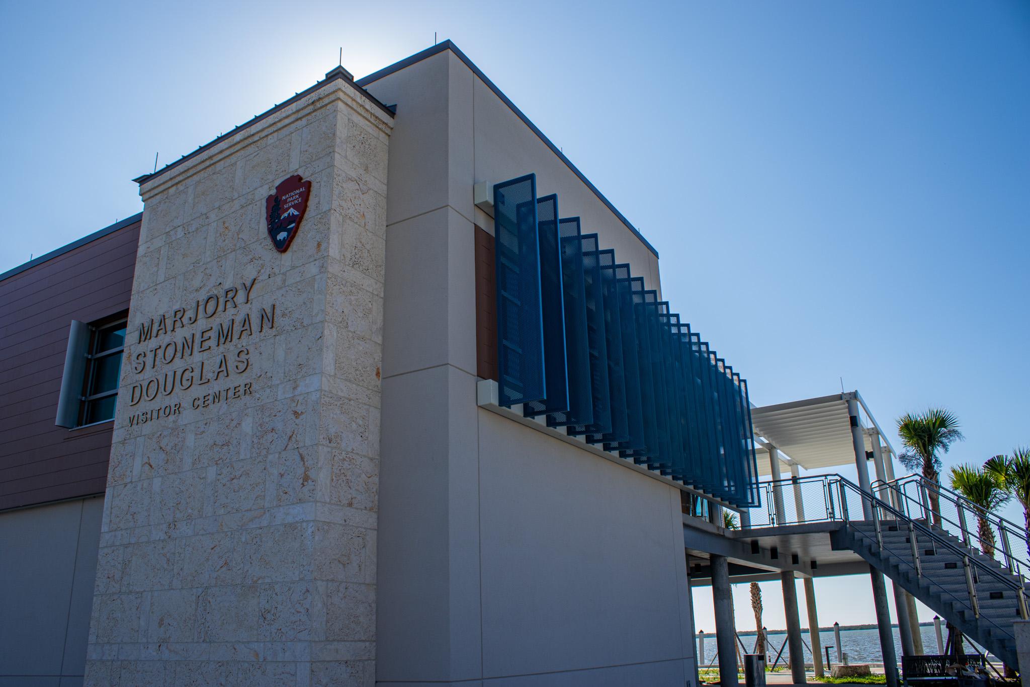 Architectural sunshade panels along the visitor center exterior.