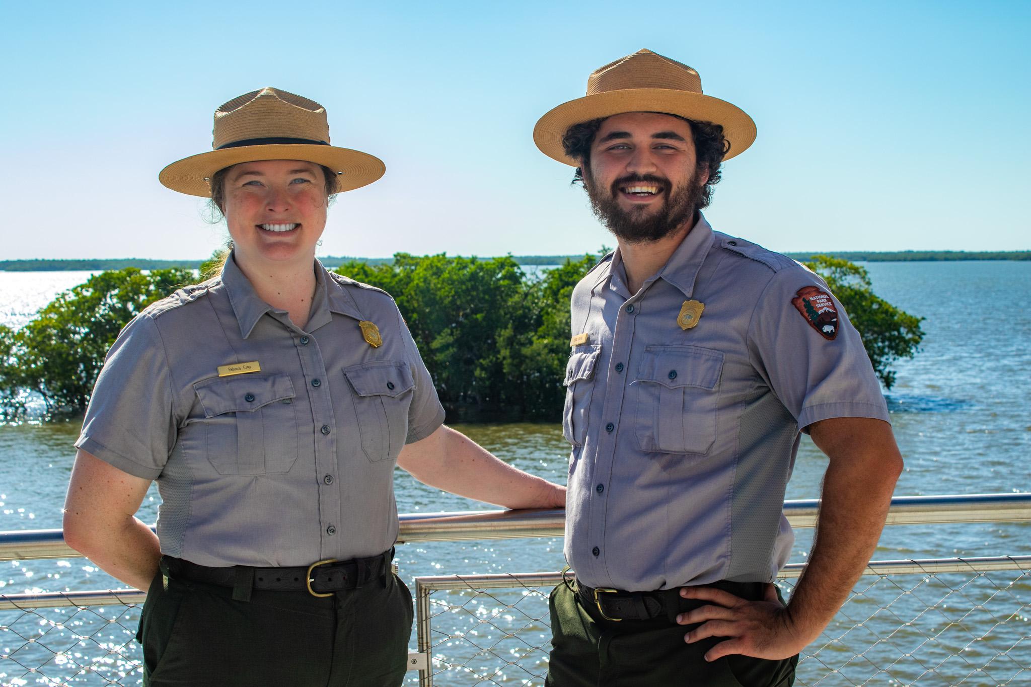 Park rangers standing on the visitor center overlook.