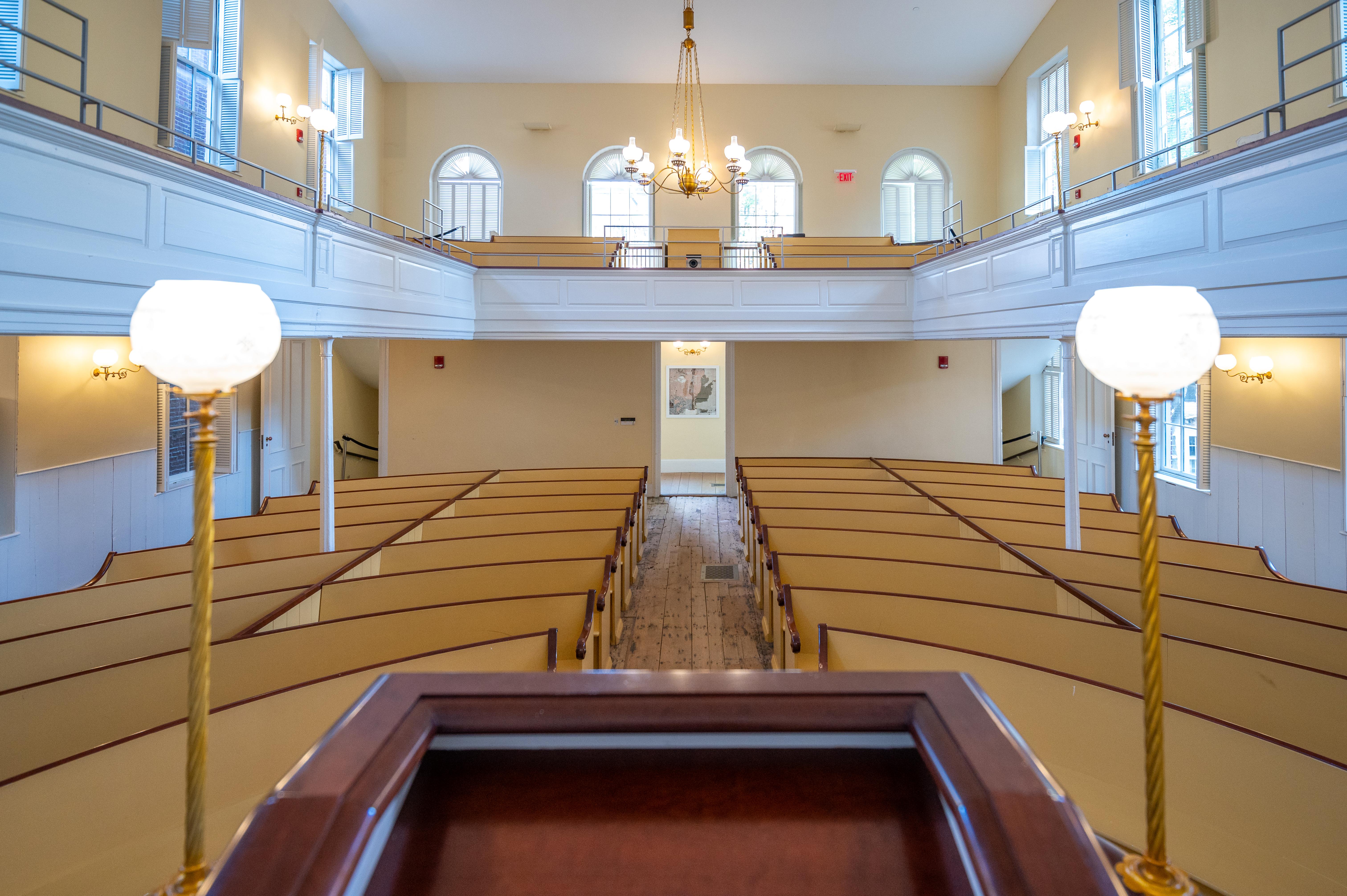View from the pulpit at the African Meeting House, which has rows of benches and an upper gallery
