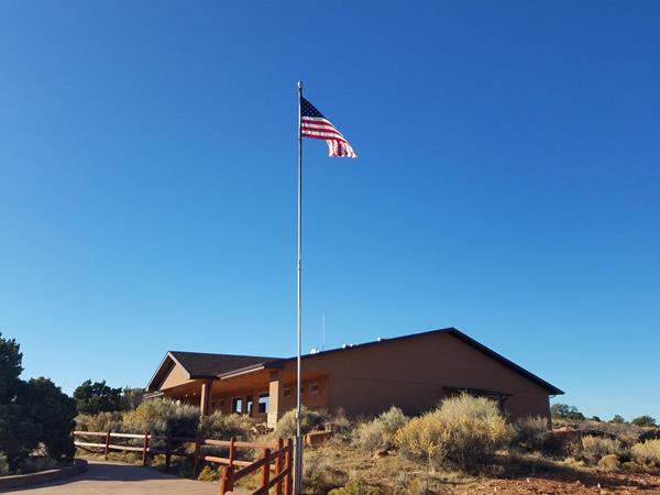 Island in the Sky Visitor Center building and flag pole.