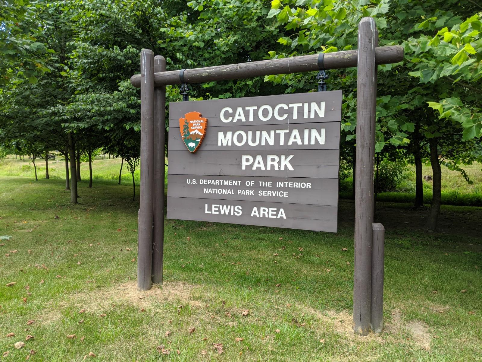 Sign reading Catoctin Mountain Park U.S. Department of the Interior National Park Service Lewis Area