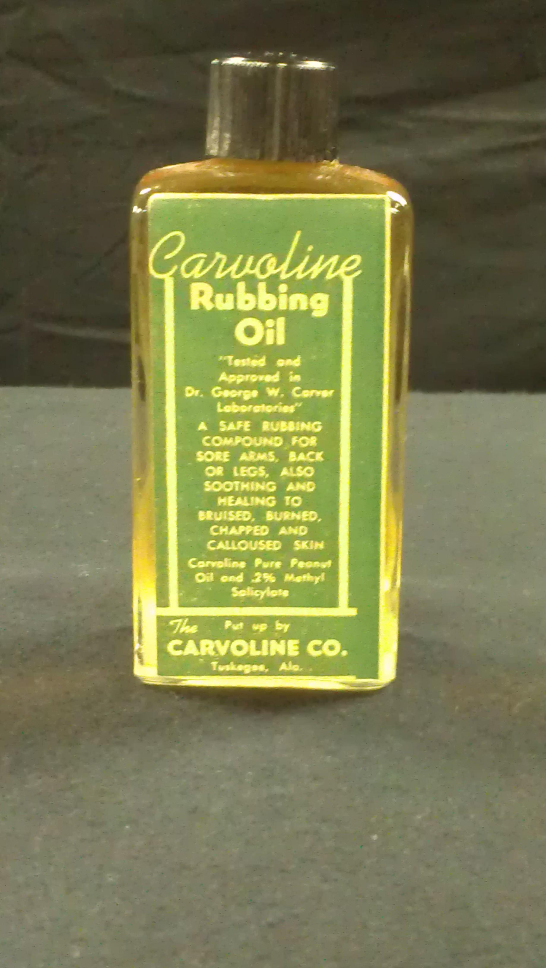 Bottle of Peanut Oil with green label - one of Dr. Carver's many uses for the peanut