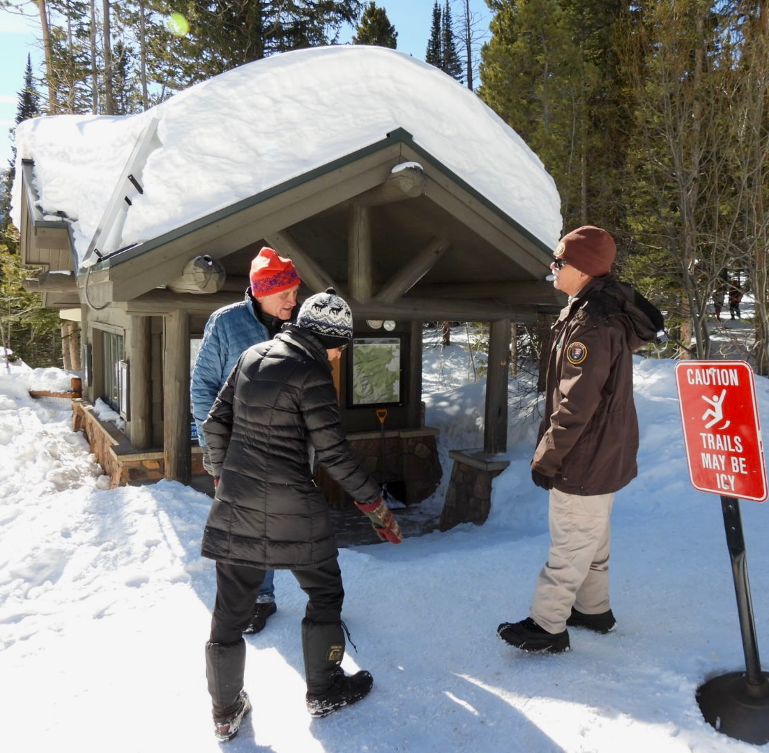 Visitors are at the Bear Lake Ranger Station in spring