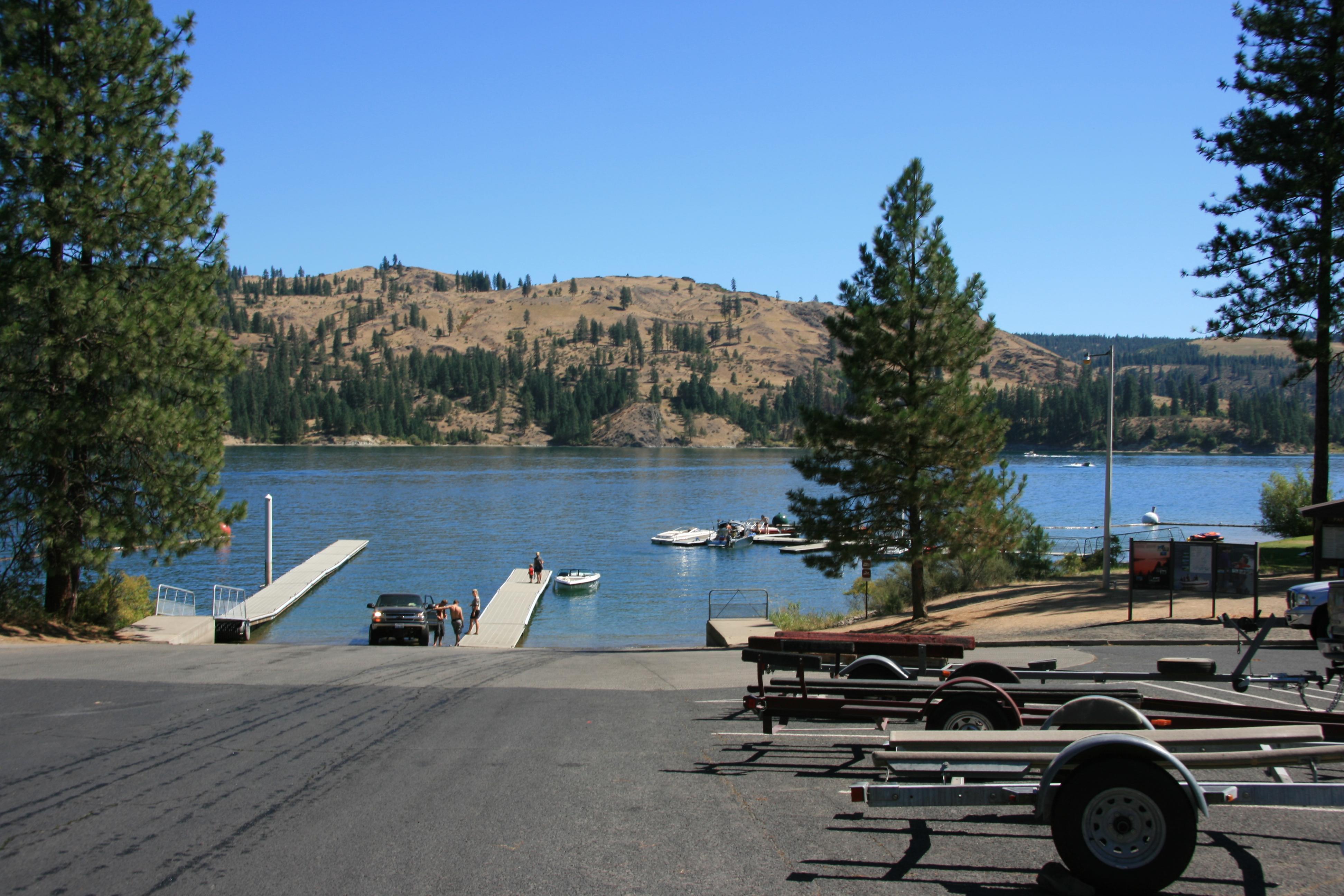 boat launch from the shore. Spokane Arm of Lake Roosevelt in the back ground.