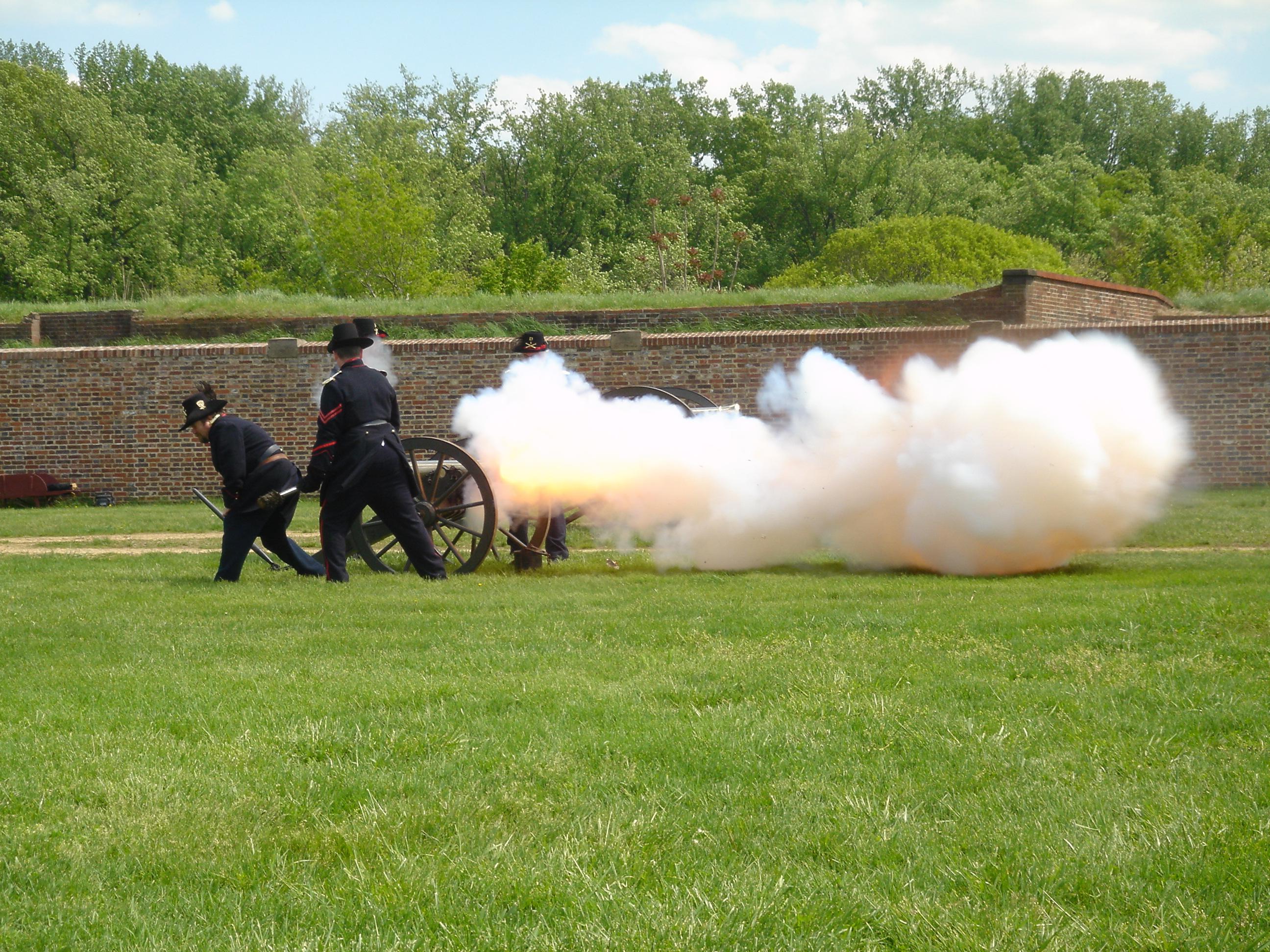 Fort Washington Volunteers firing a cannon