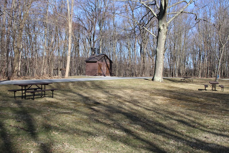 The portalettes near the picnic area. Picnic pavilion