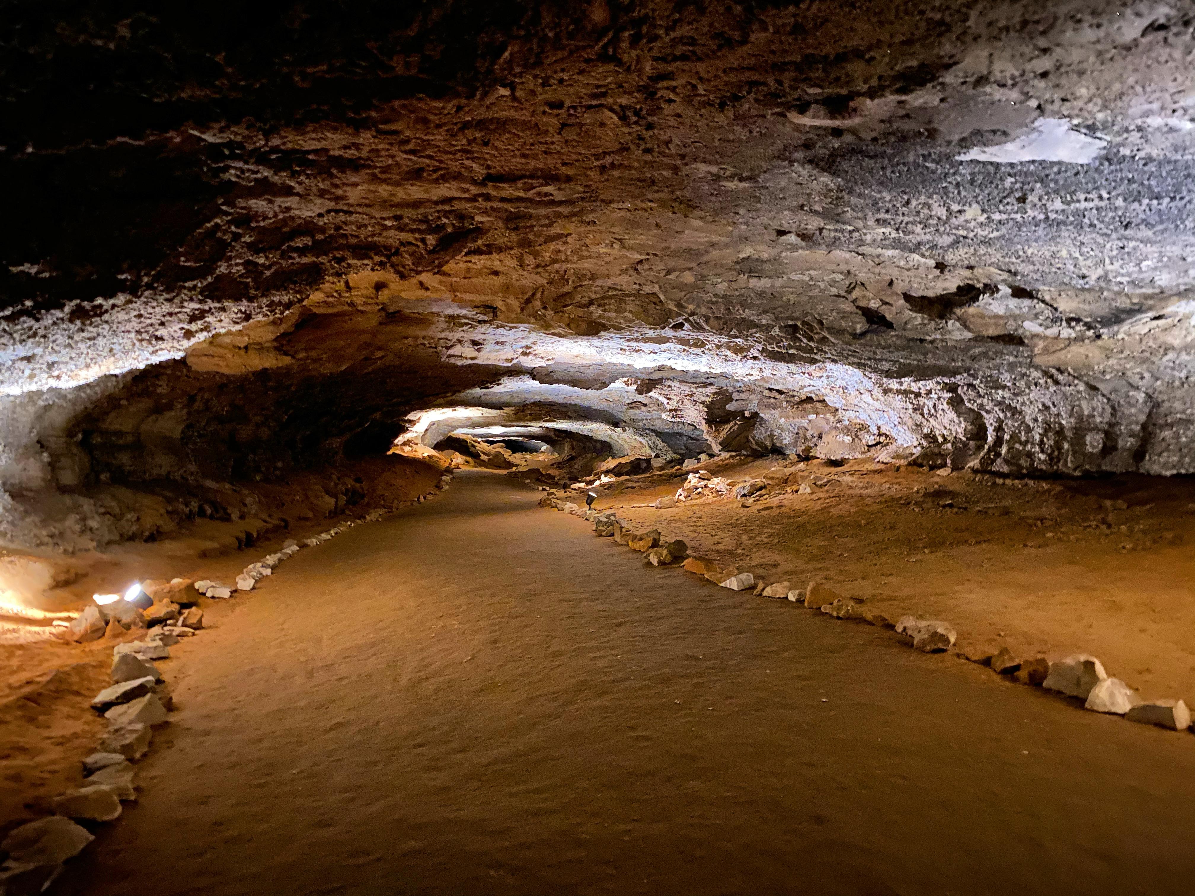 A long cave passage with an oval shape.