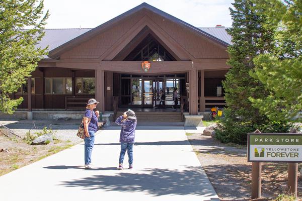 Visitors stand in front of Grant Visitor Center