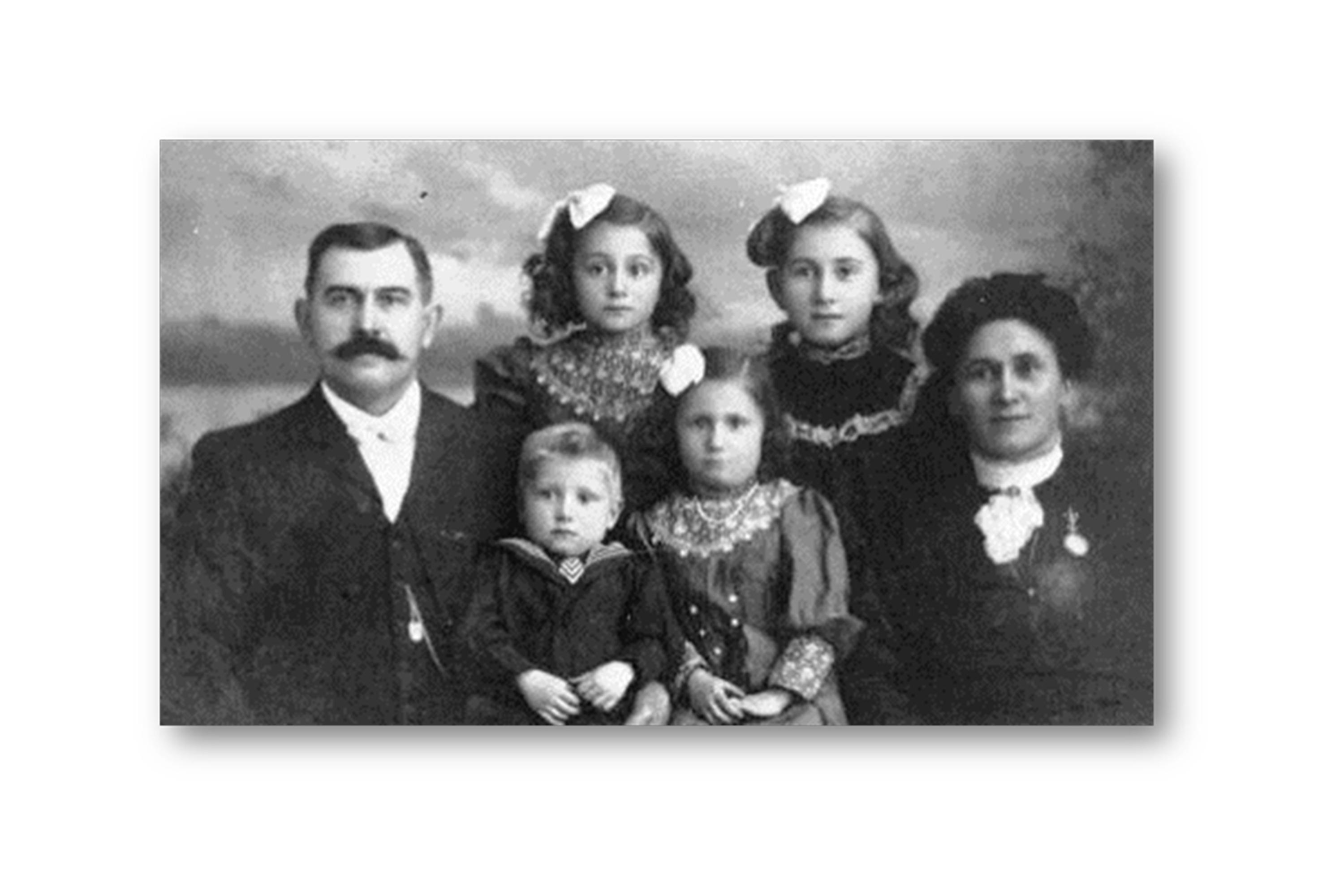 Black and white photo featuring the Holzwarth Family