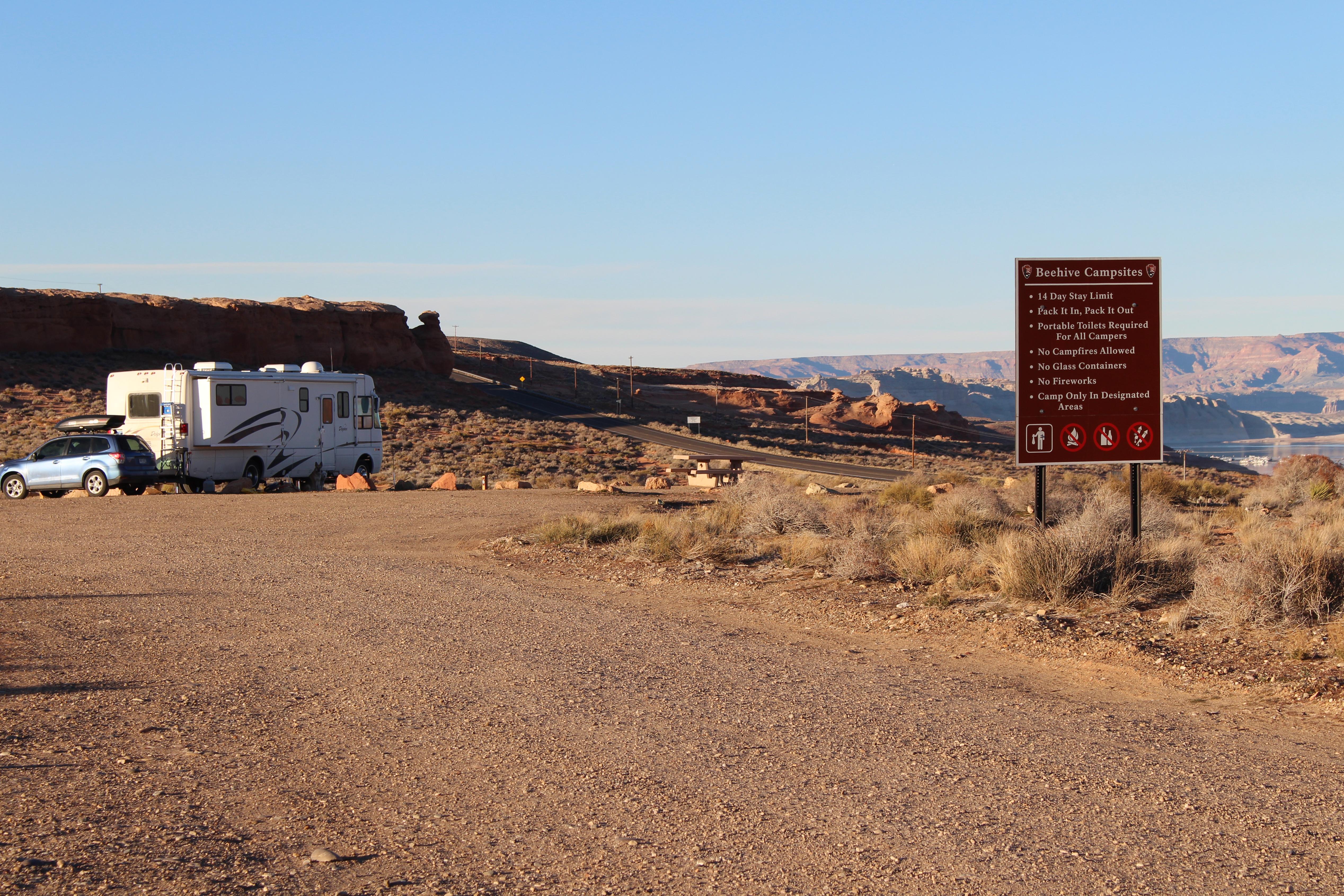 Primitive campground with regulation sign. RV